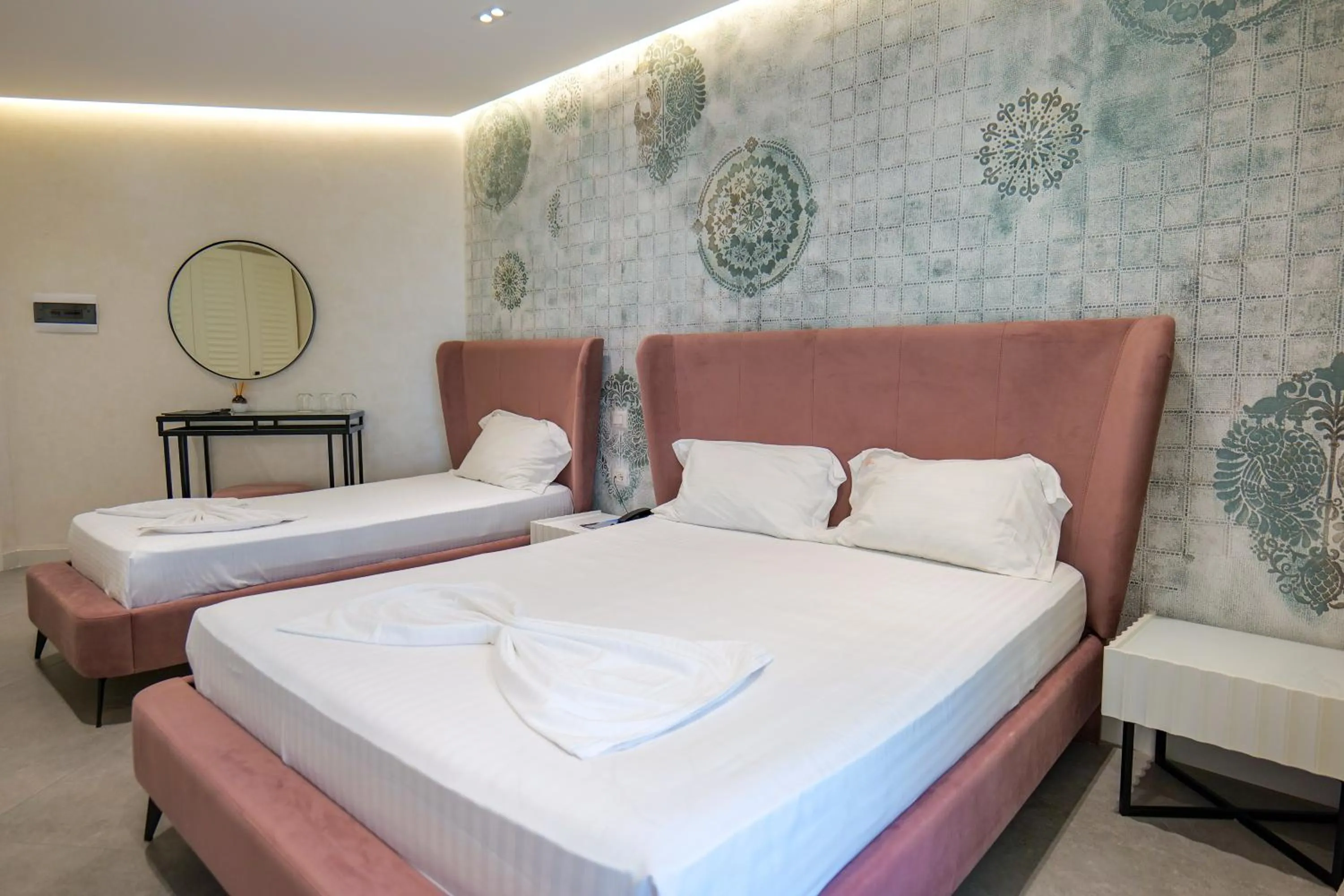 Bed in HH Boutique Hotel