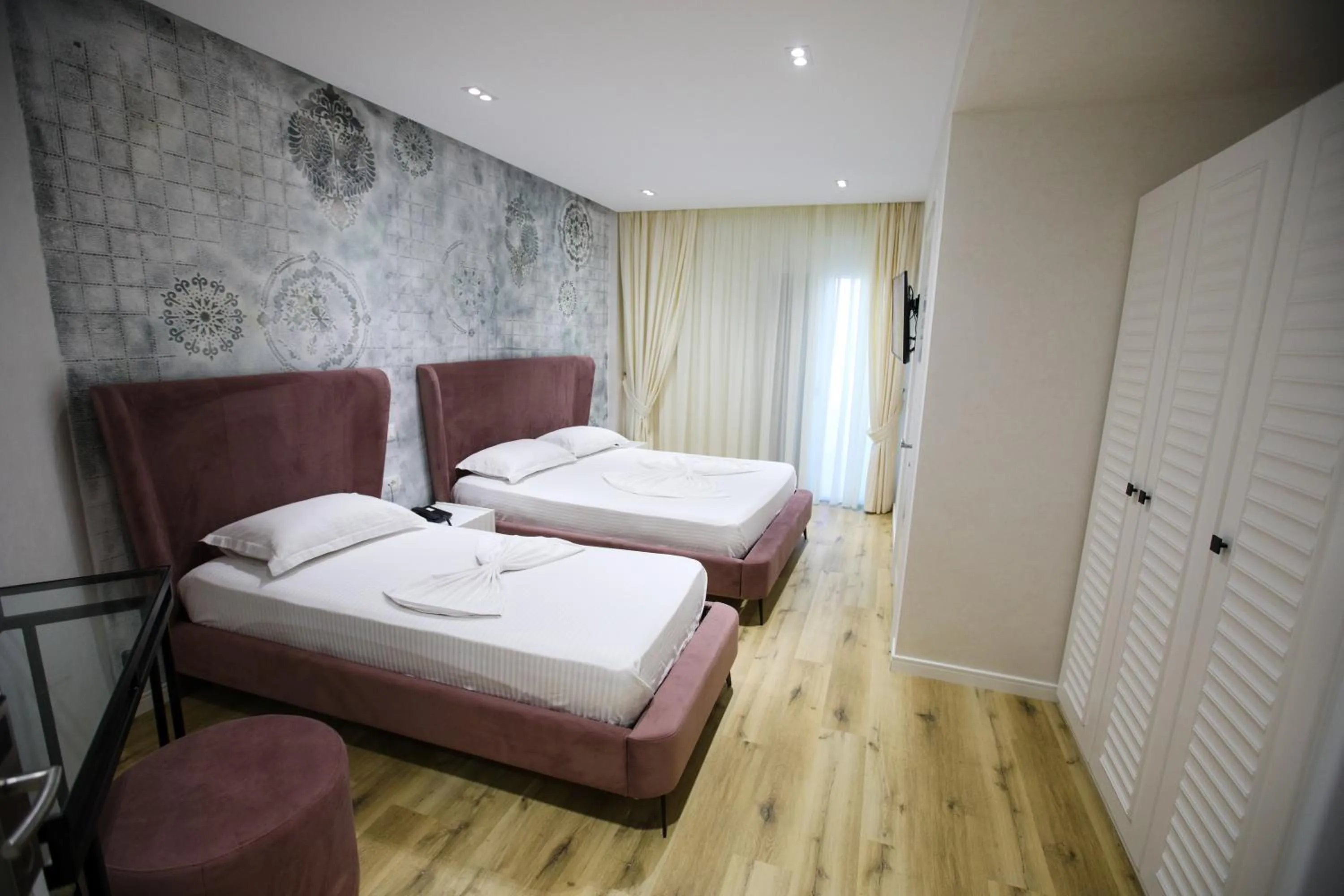 Bed in HH Boutique Hotel