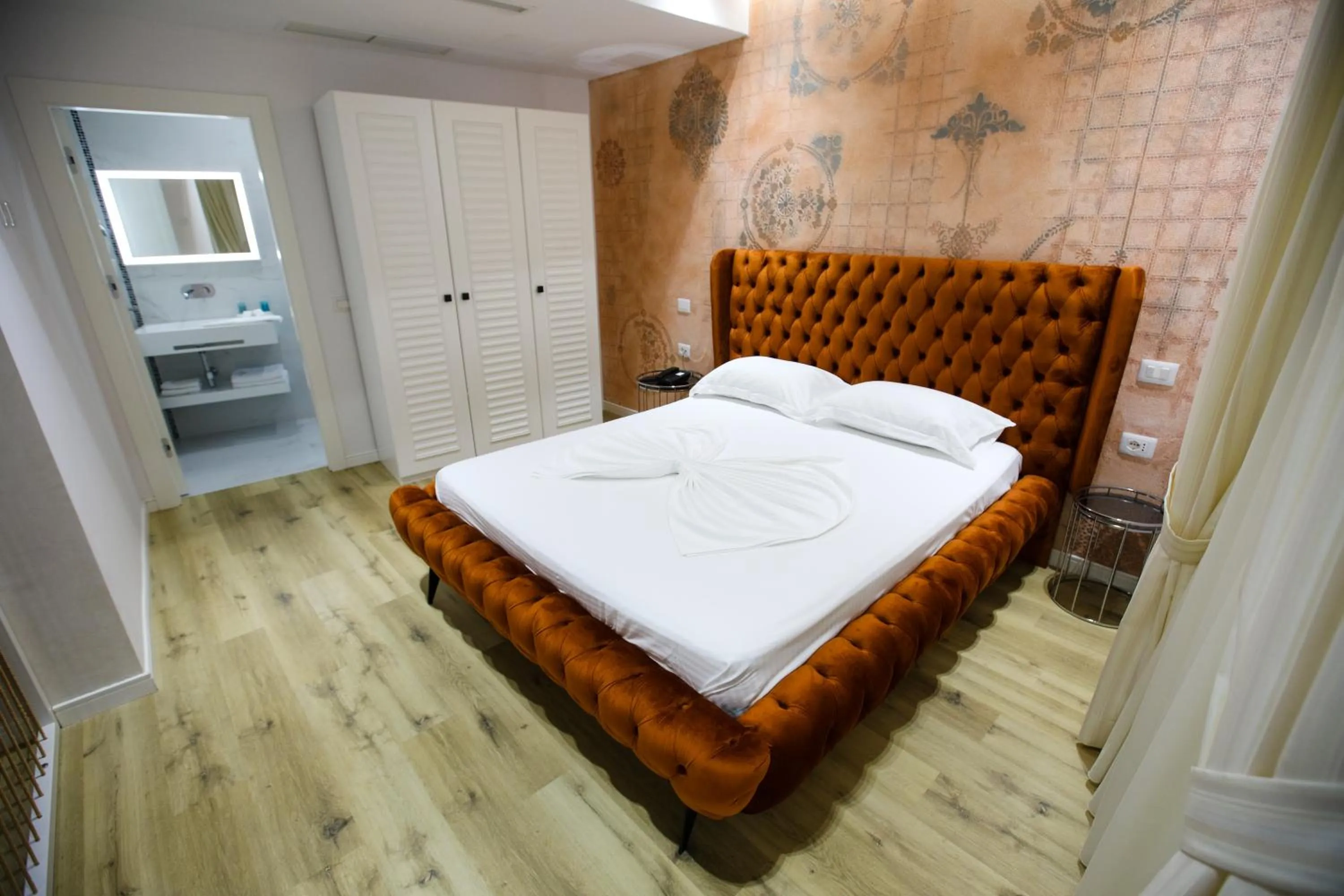 Bed in HH Boutique Hotel