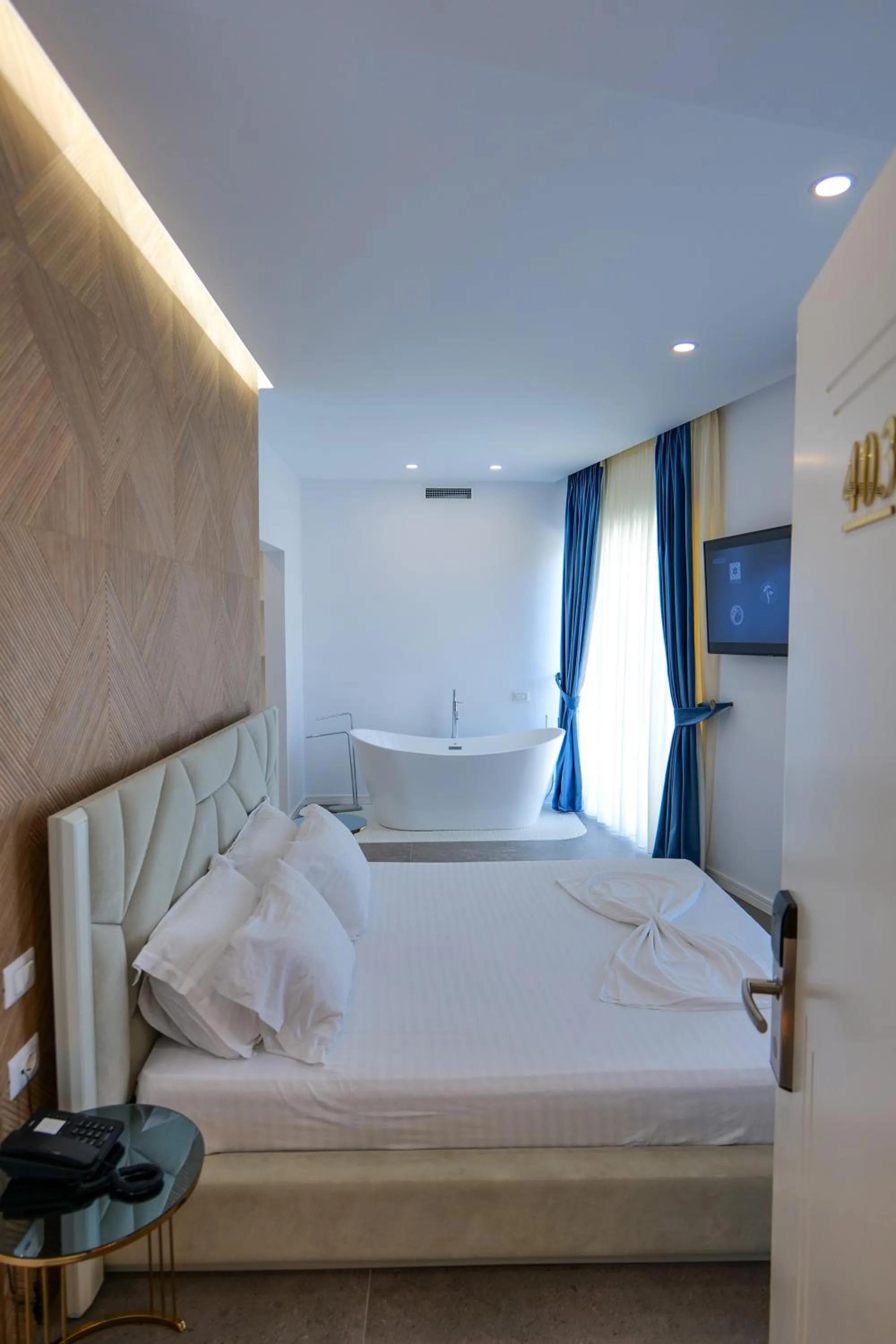 Bed in Blue Boutique Hotel