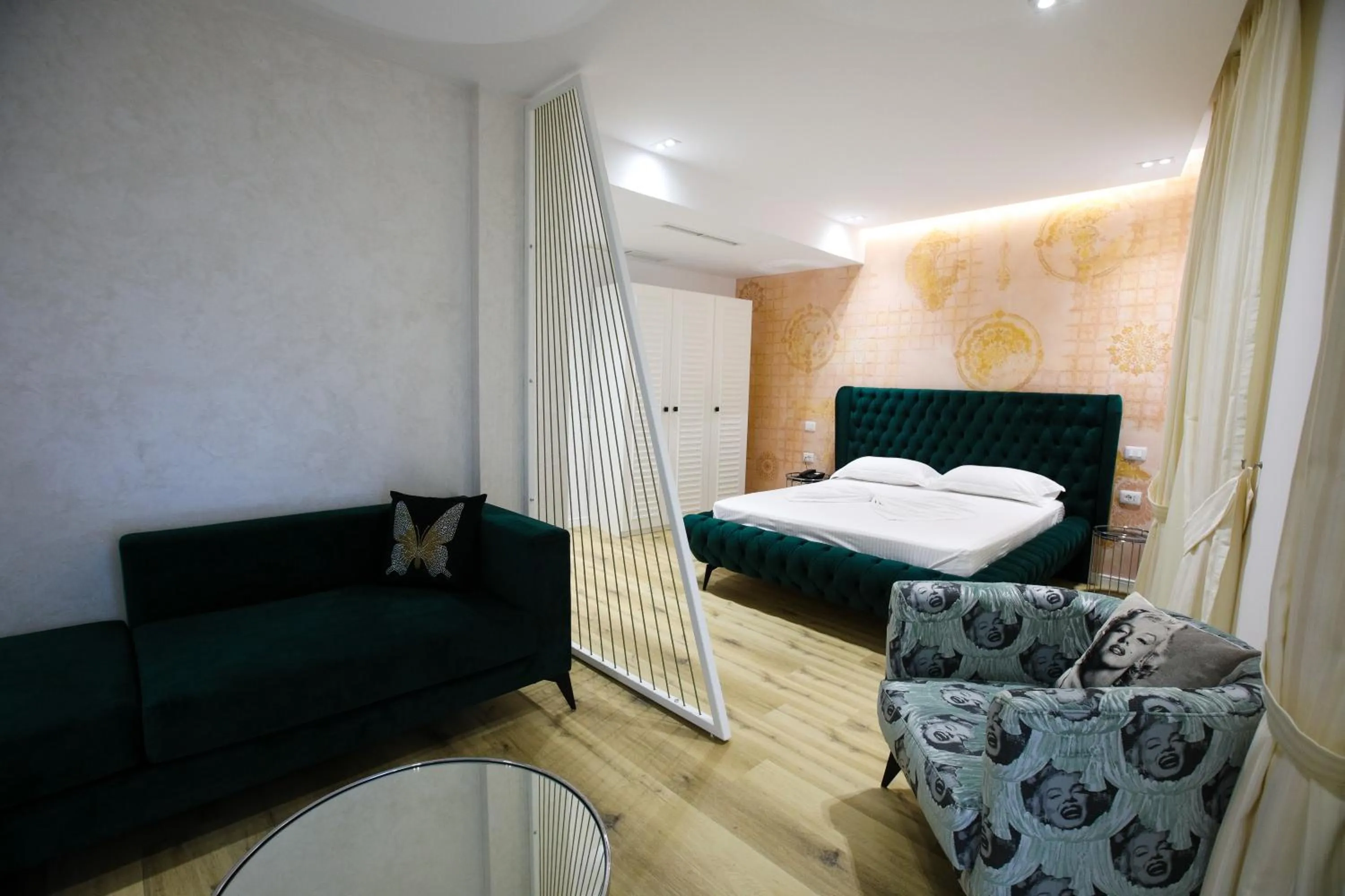 Bed in HH Boutique Hotel