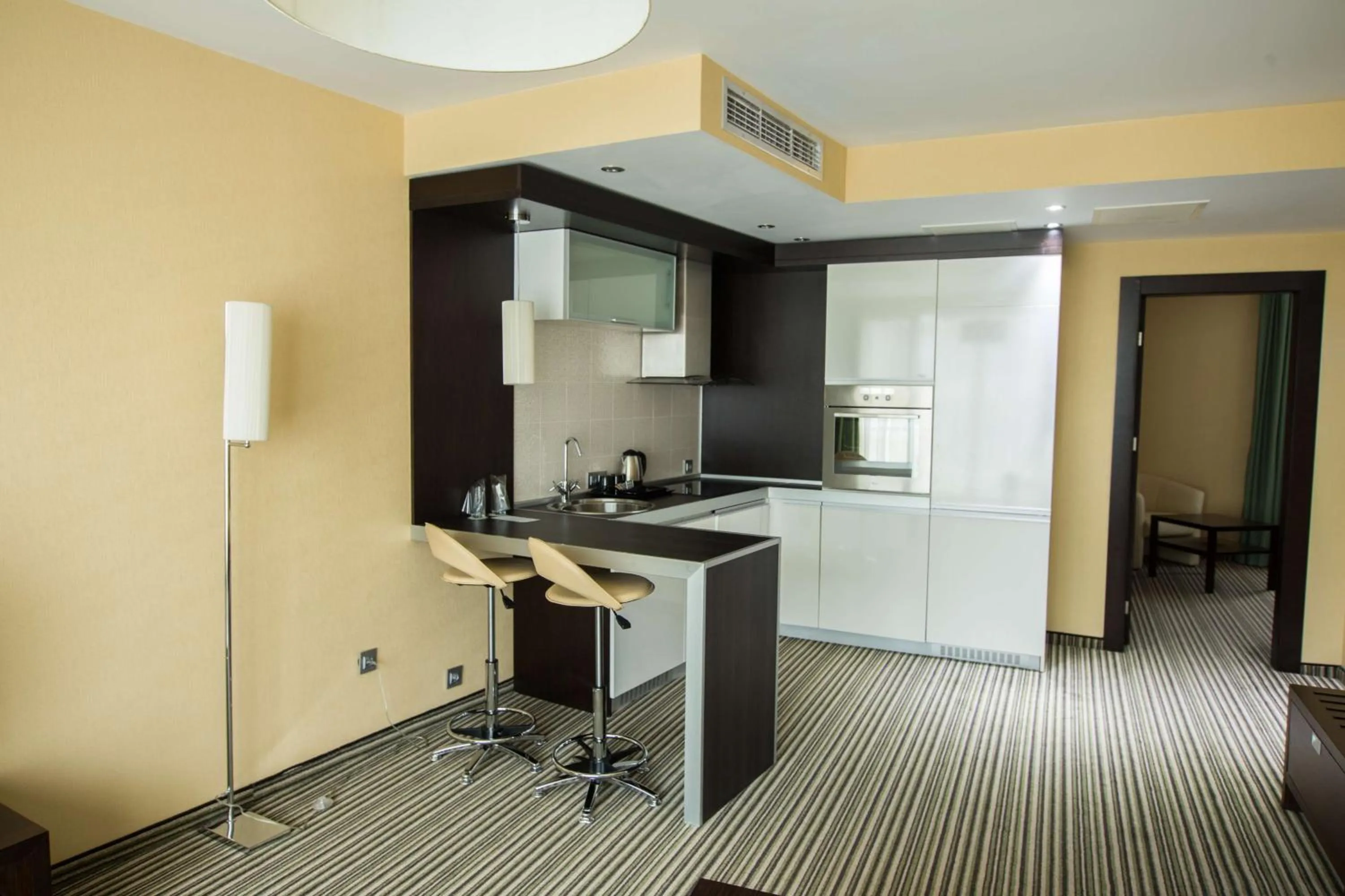 Kitchen or kitchenette in Best Western Plus Olives City Hotel - Free Pool & Parking