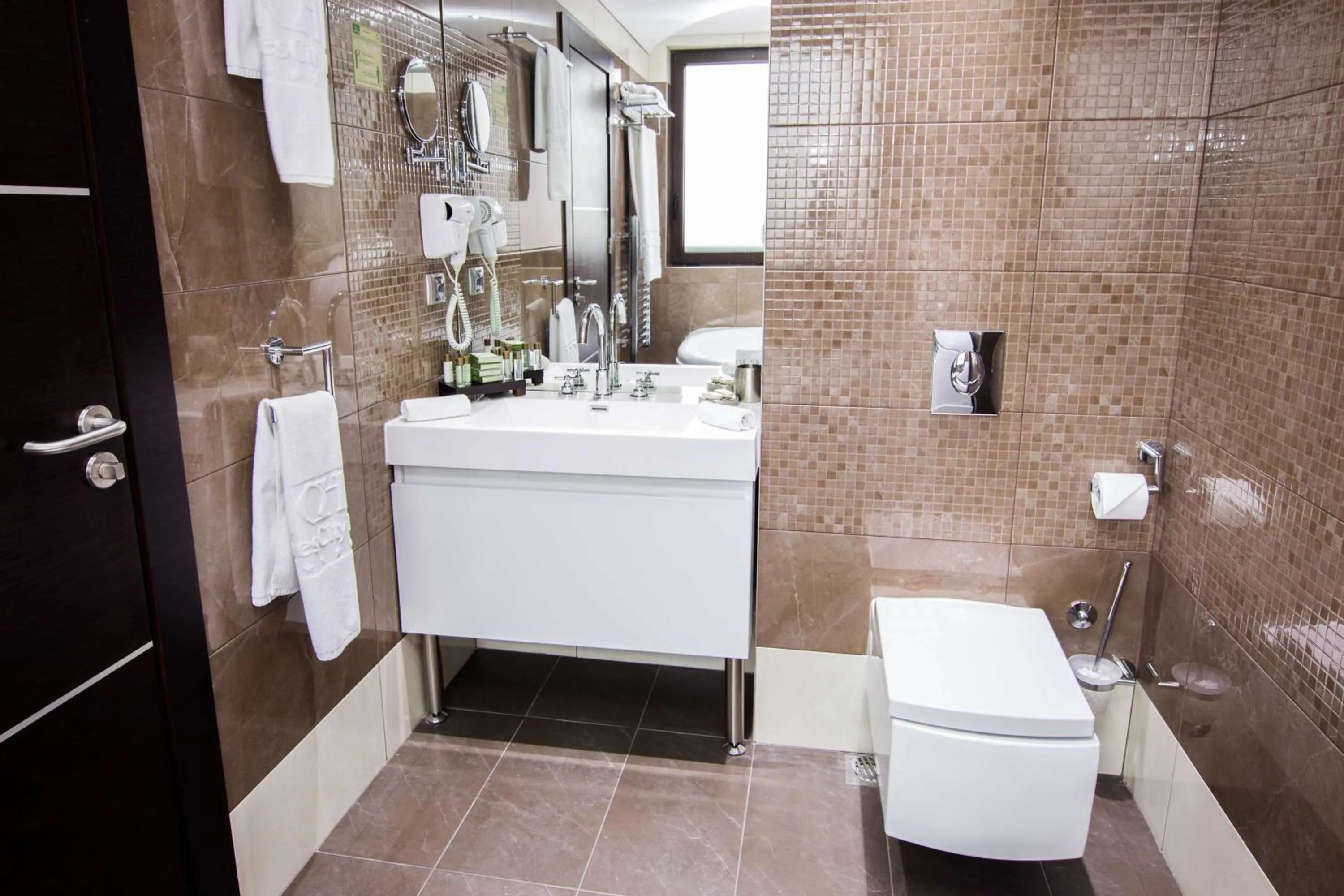 Bathroom in Best Western Plus Olives City Hotel - Free Pool & Parking