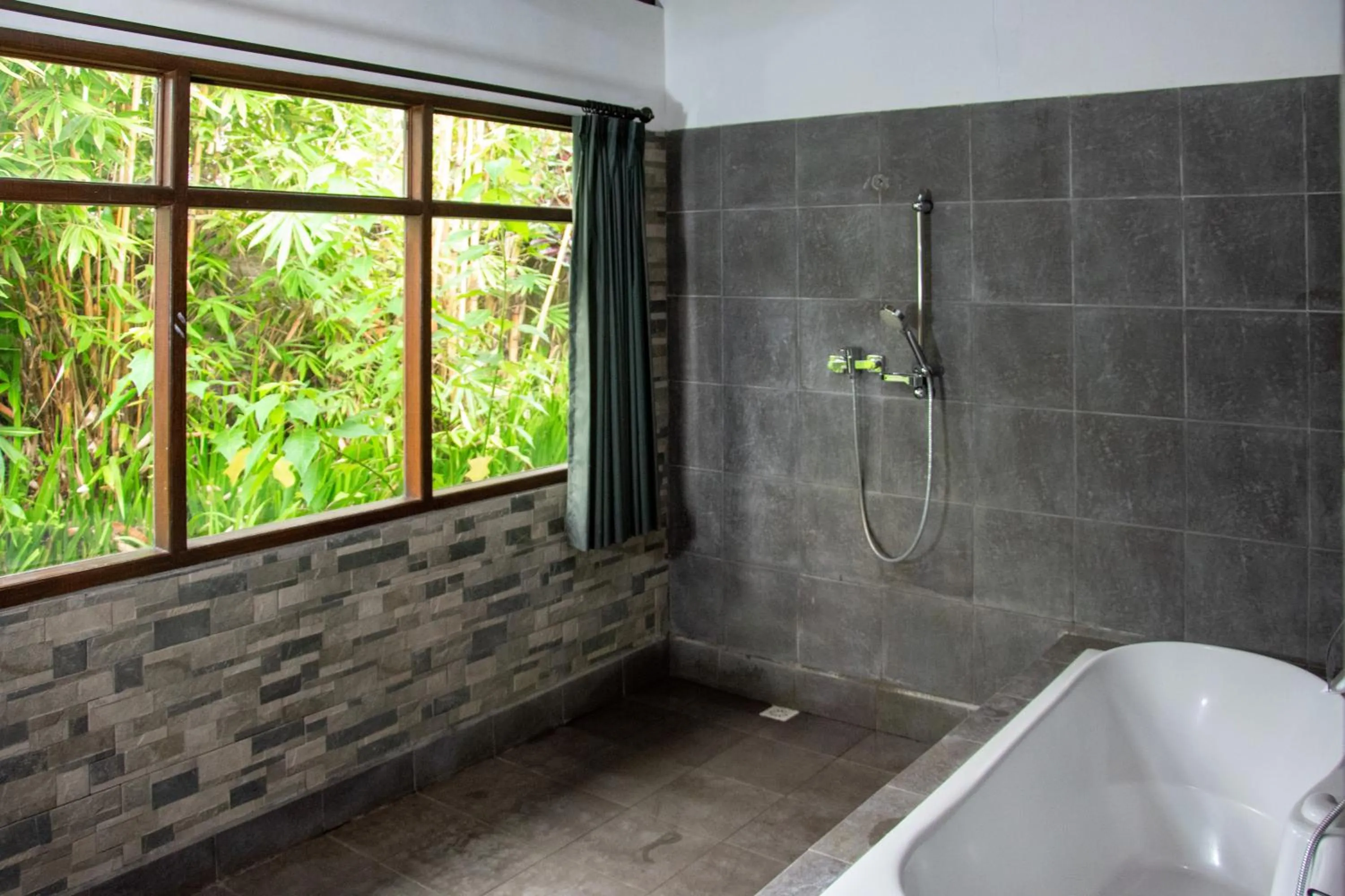 Shower in Amartya Puri Green Cottages