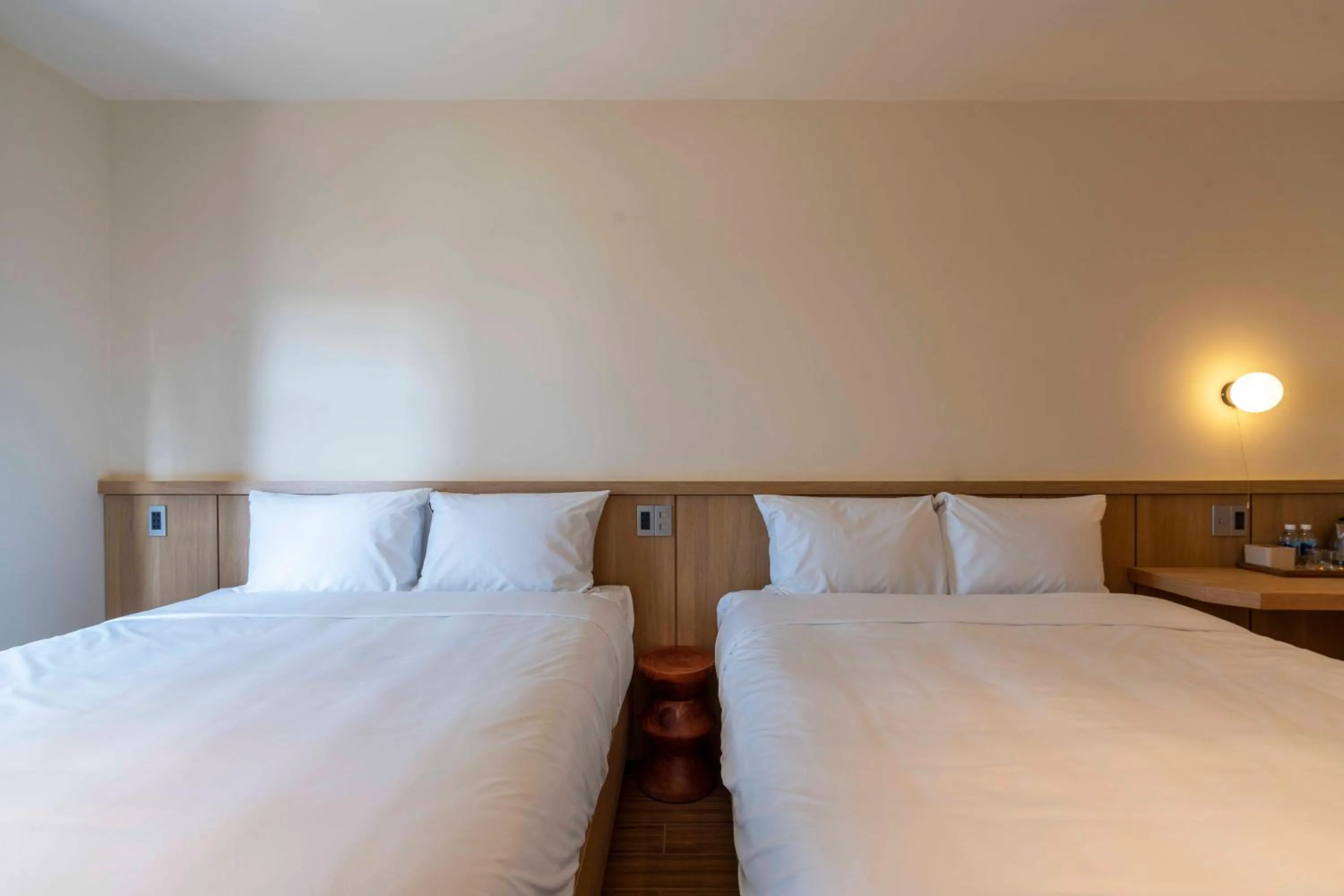 Bed in DP Hotel