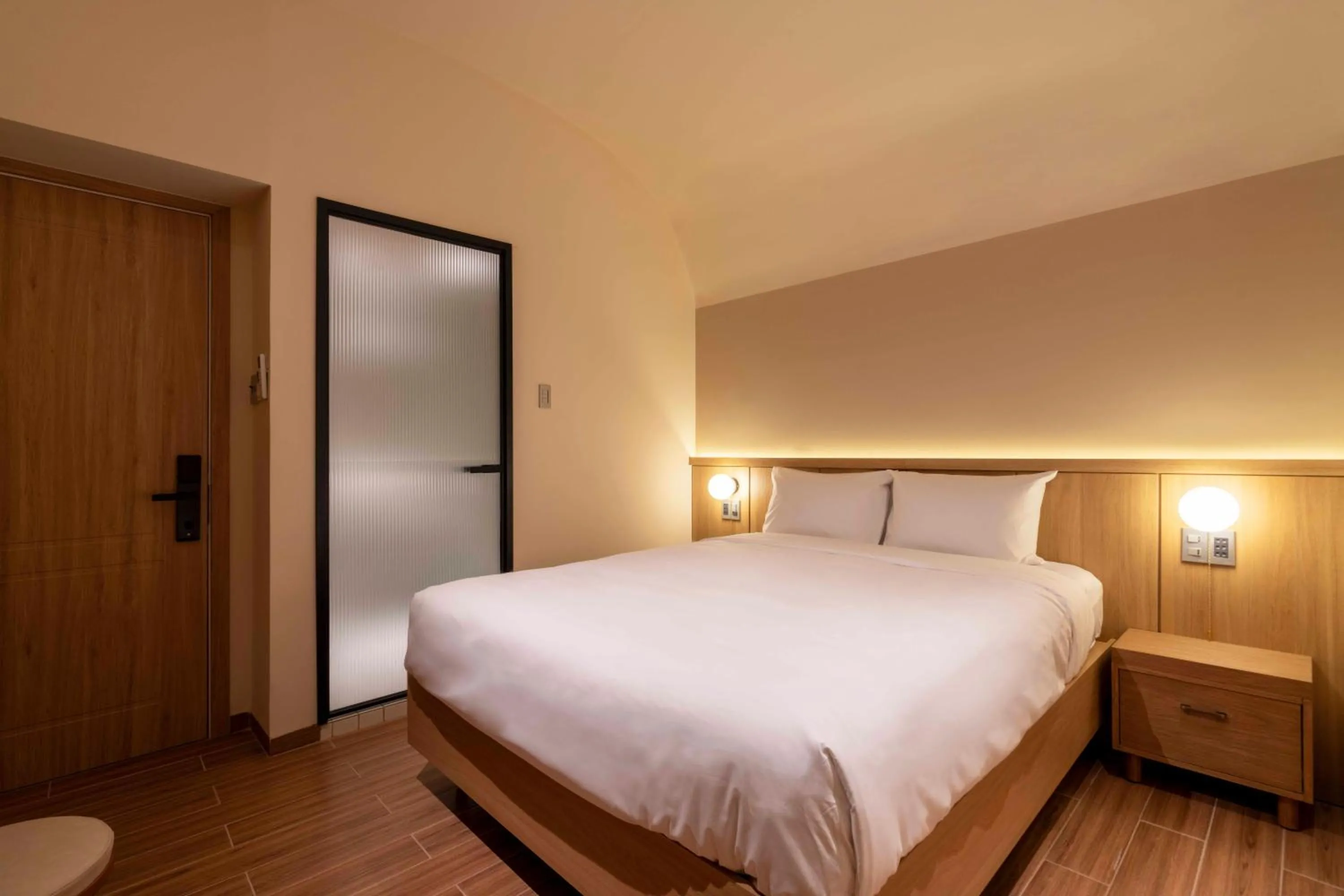 Bed in DP Hotel