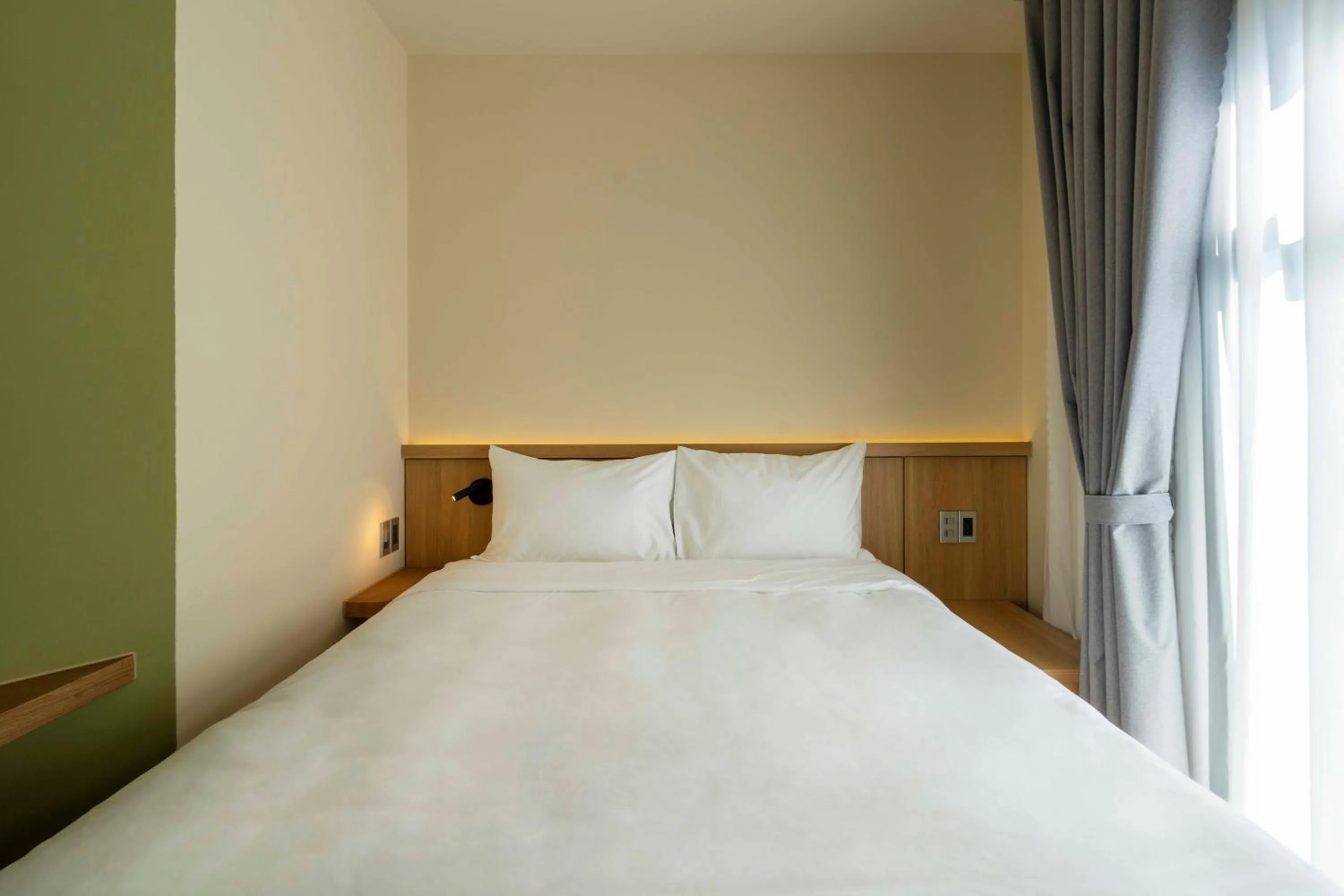 Bed in DP Hotel