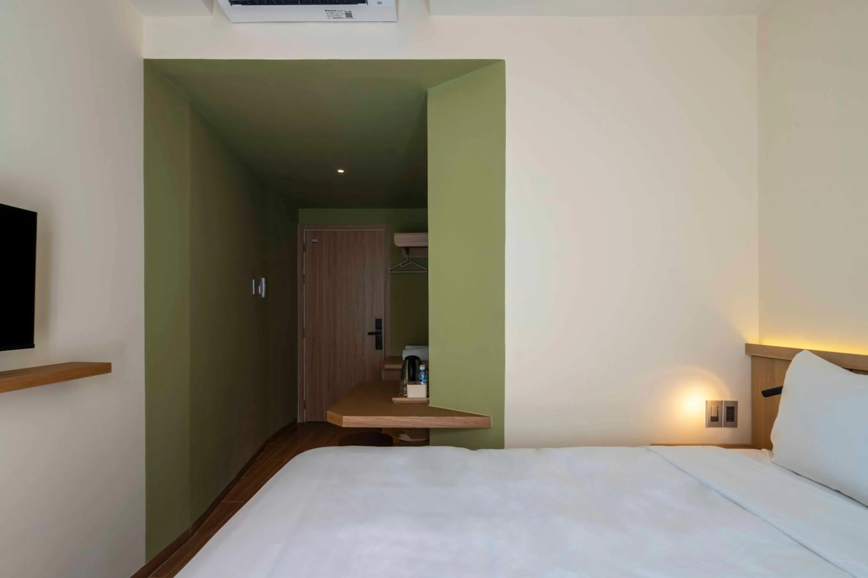 Bed in DP Hotel
