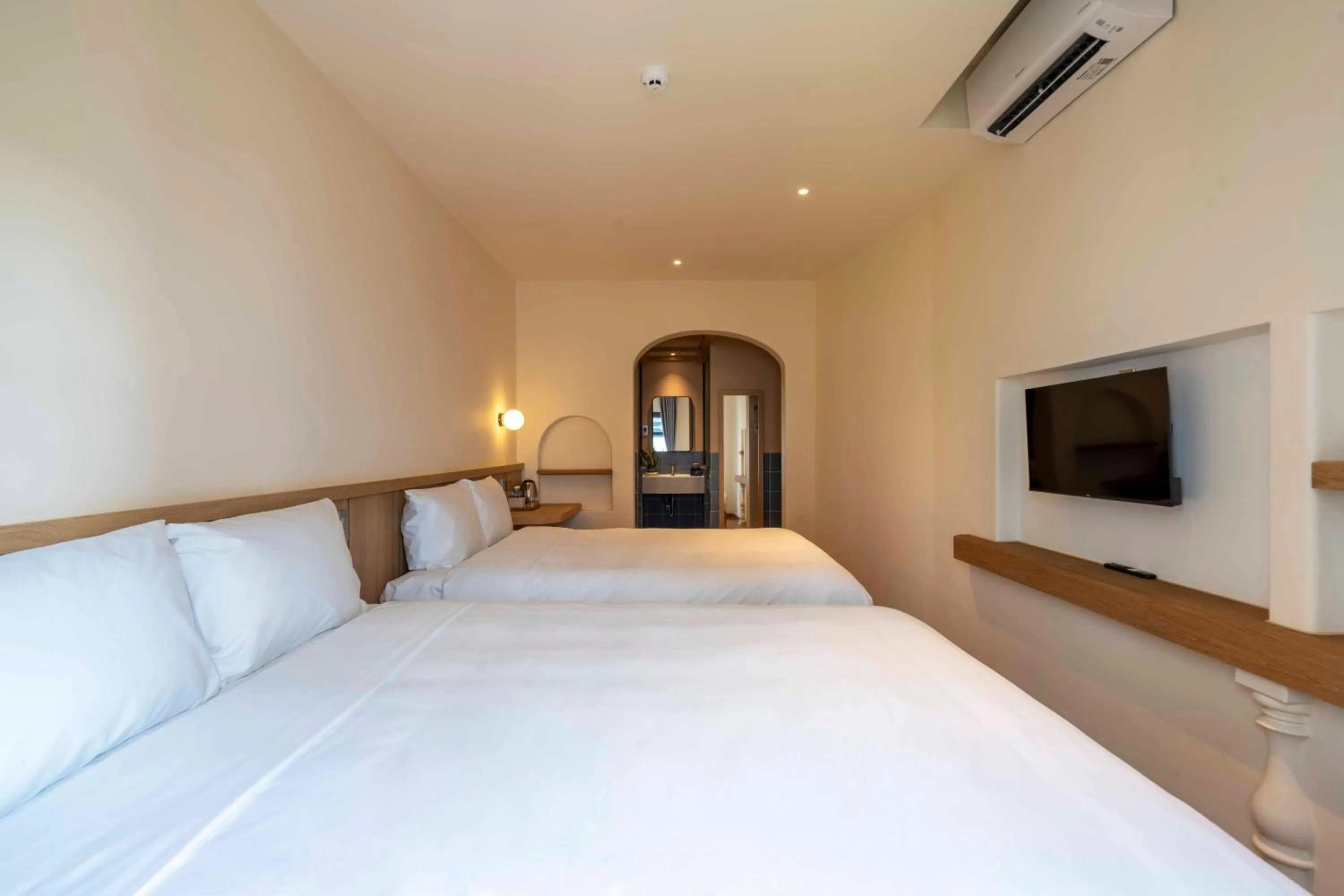 Bed in DP Hotel