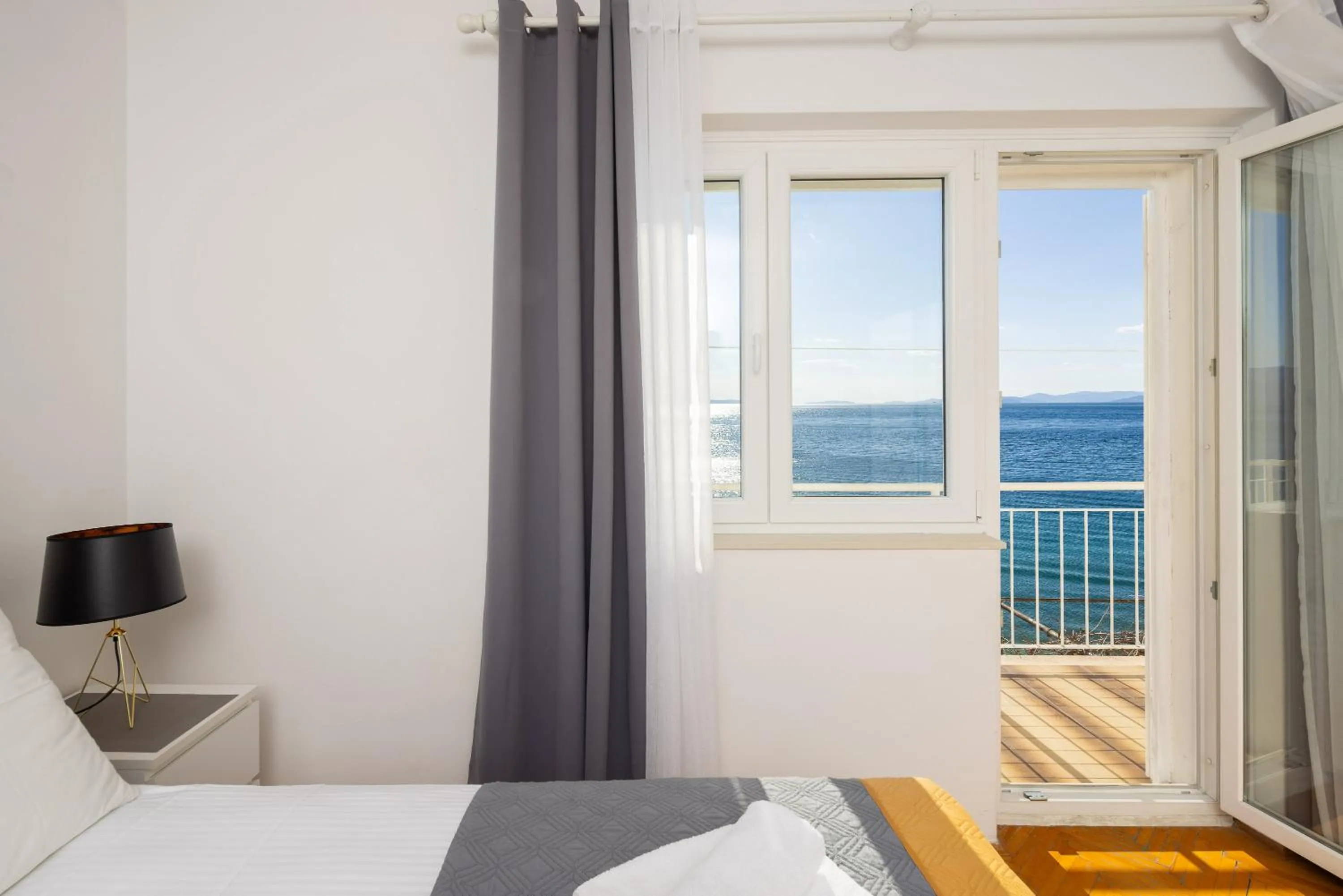 Balcony/Terrace, Bed in Seaside Apartment Blue