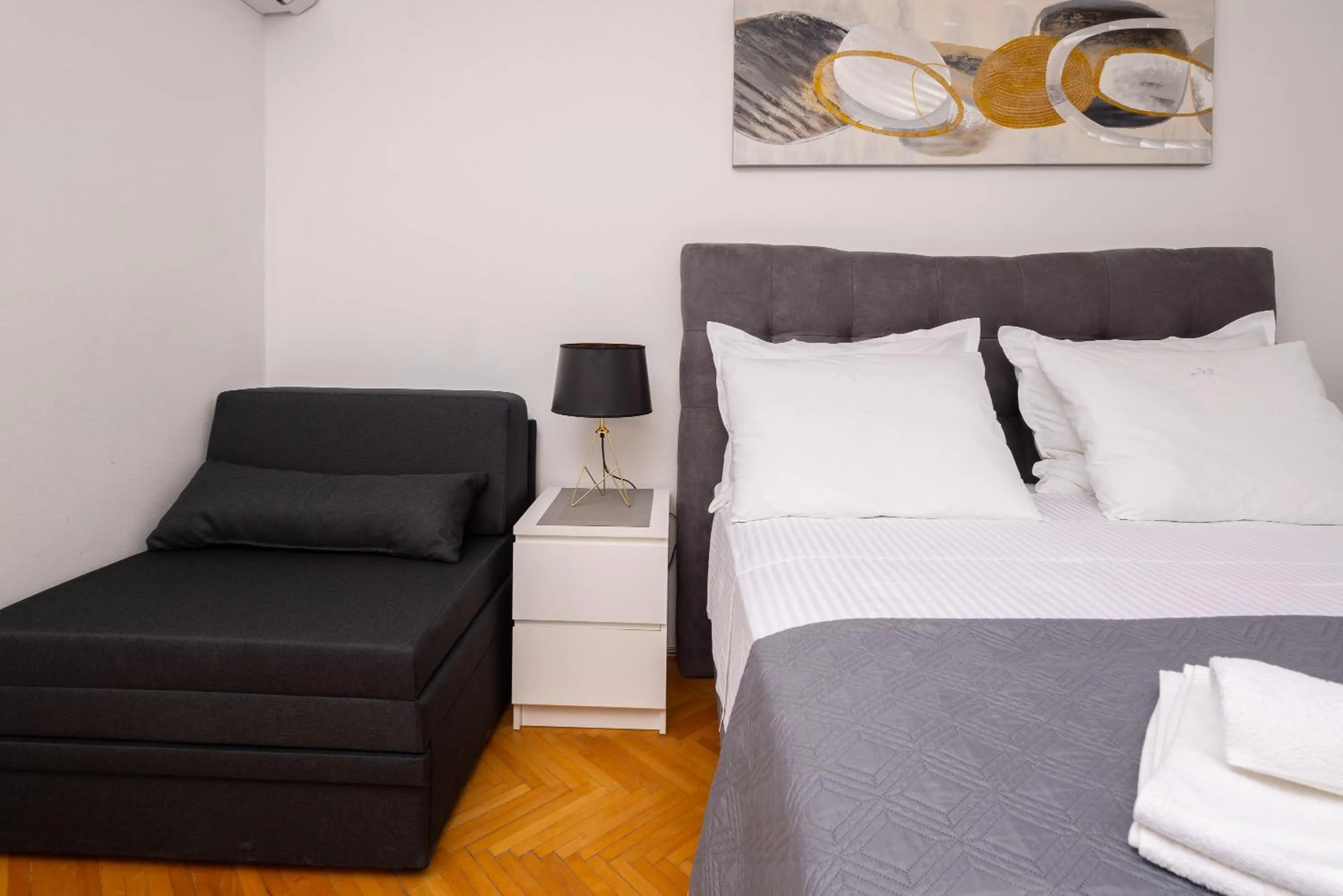 Bed in Seaside Apartment Blue