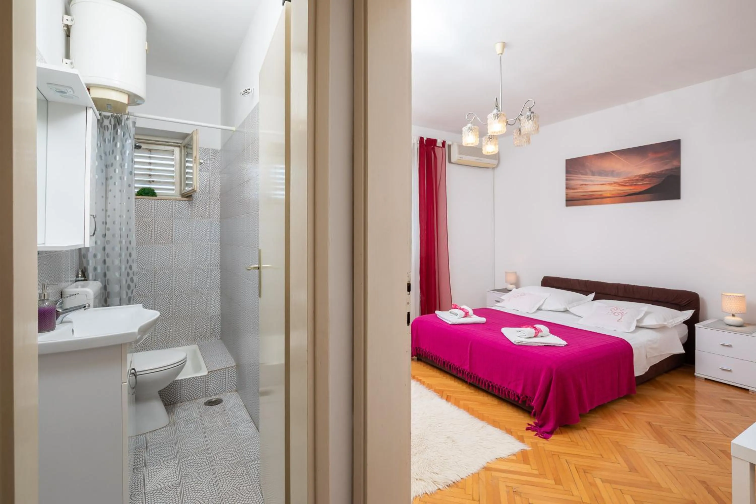 Toilet, Bed in Seaside Apartment Blue