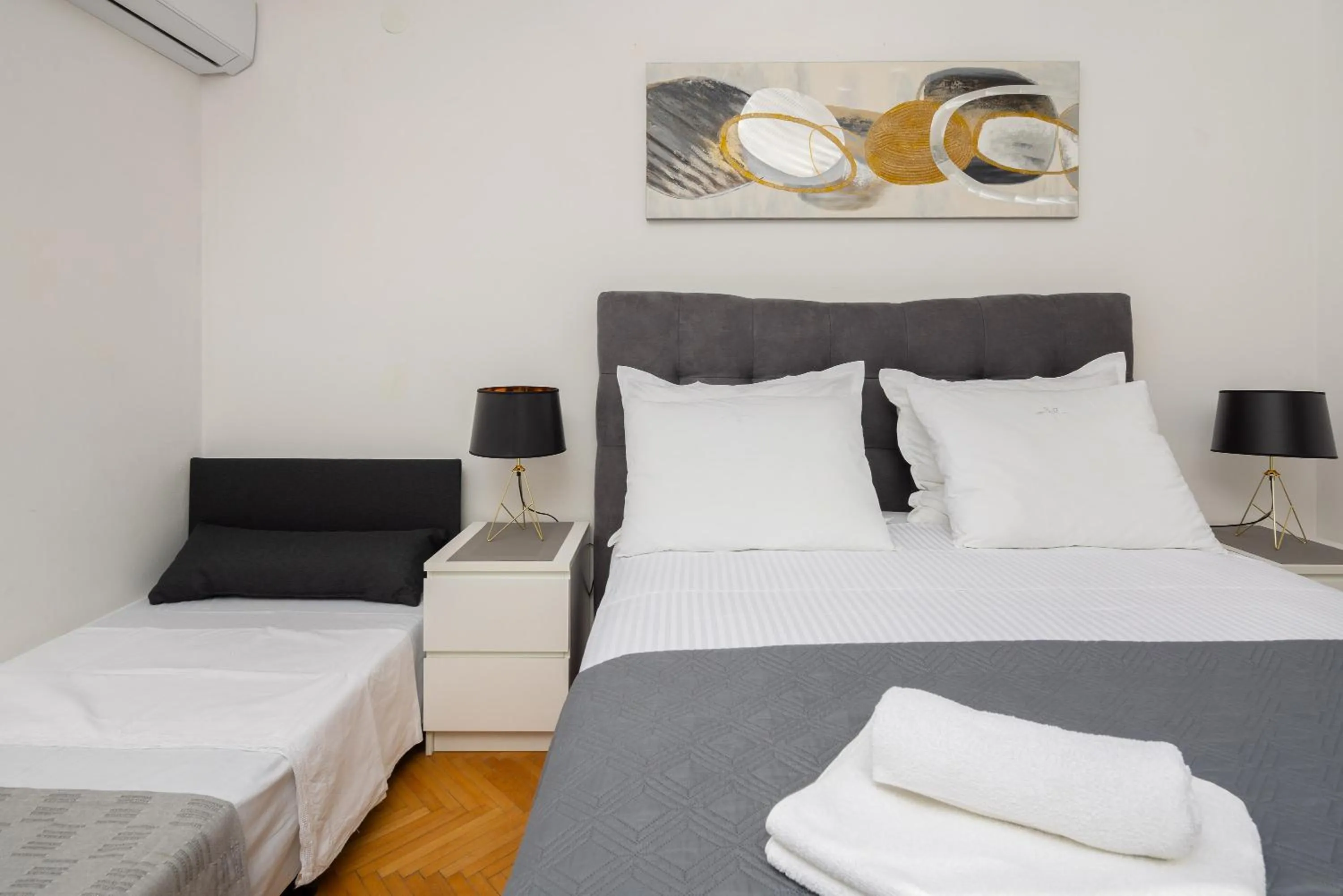 Bed in Seaside Apartment Blue