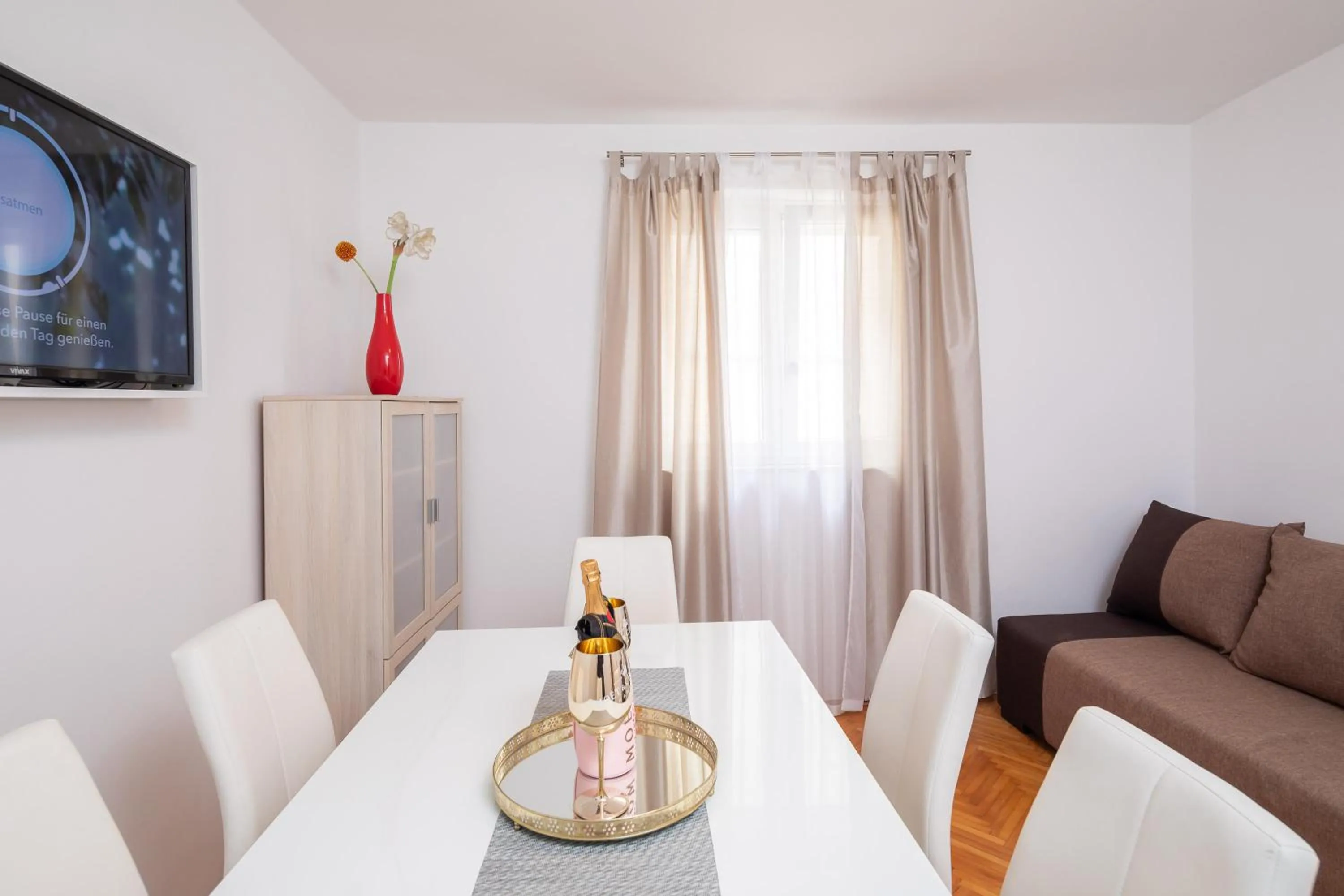 TV and multimedia in Seaside Apartment Blue
