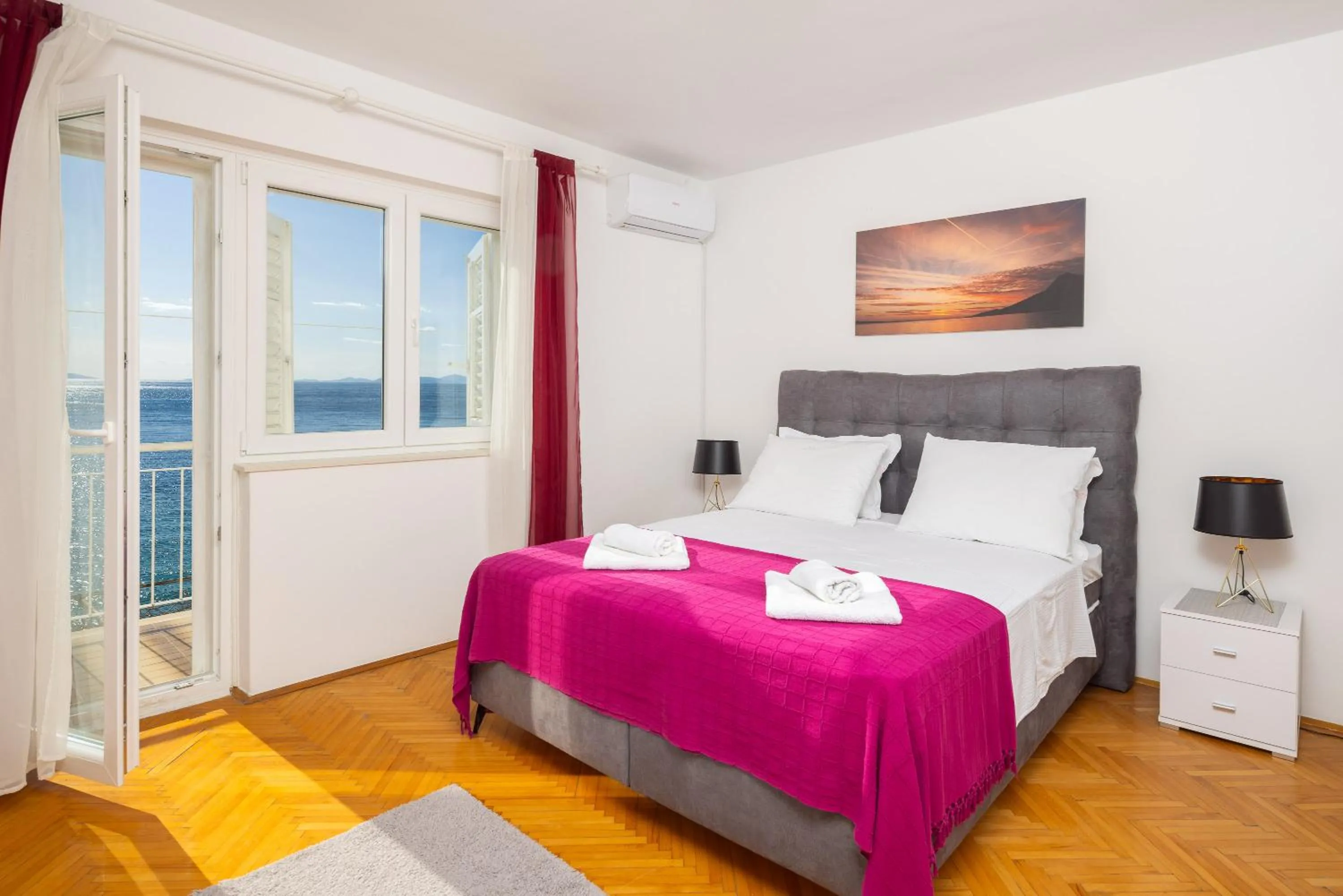 Bed in Seaside Apartment Blue