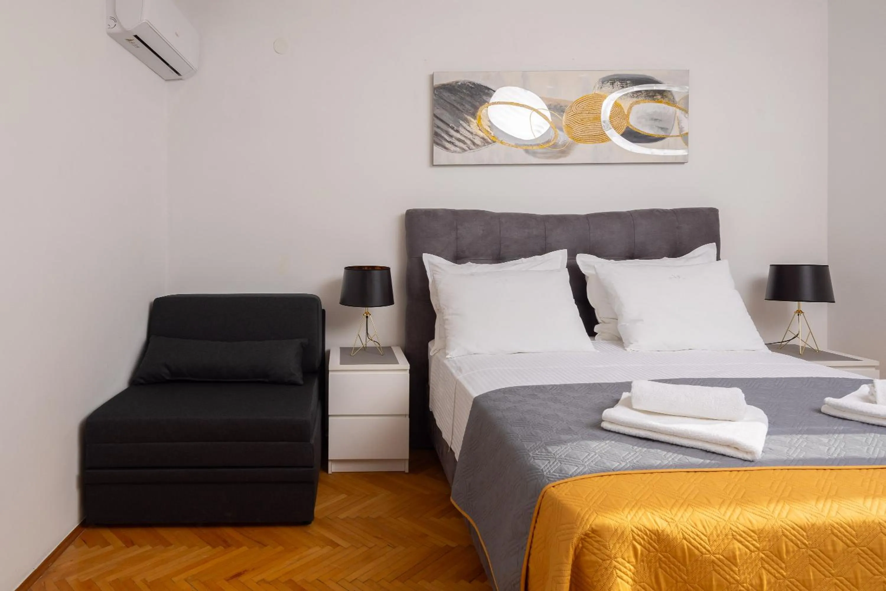 Living room, Bed in Seaside Apartment Blue