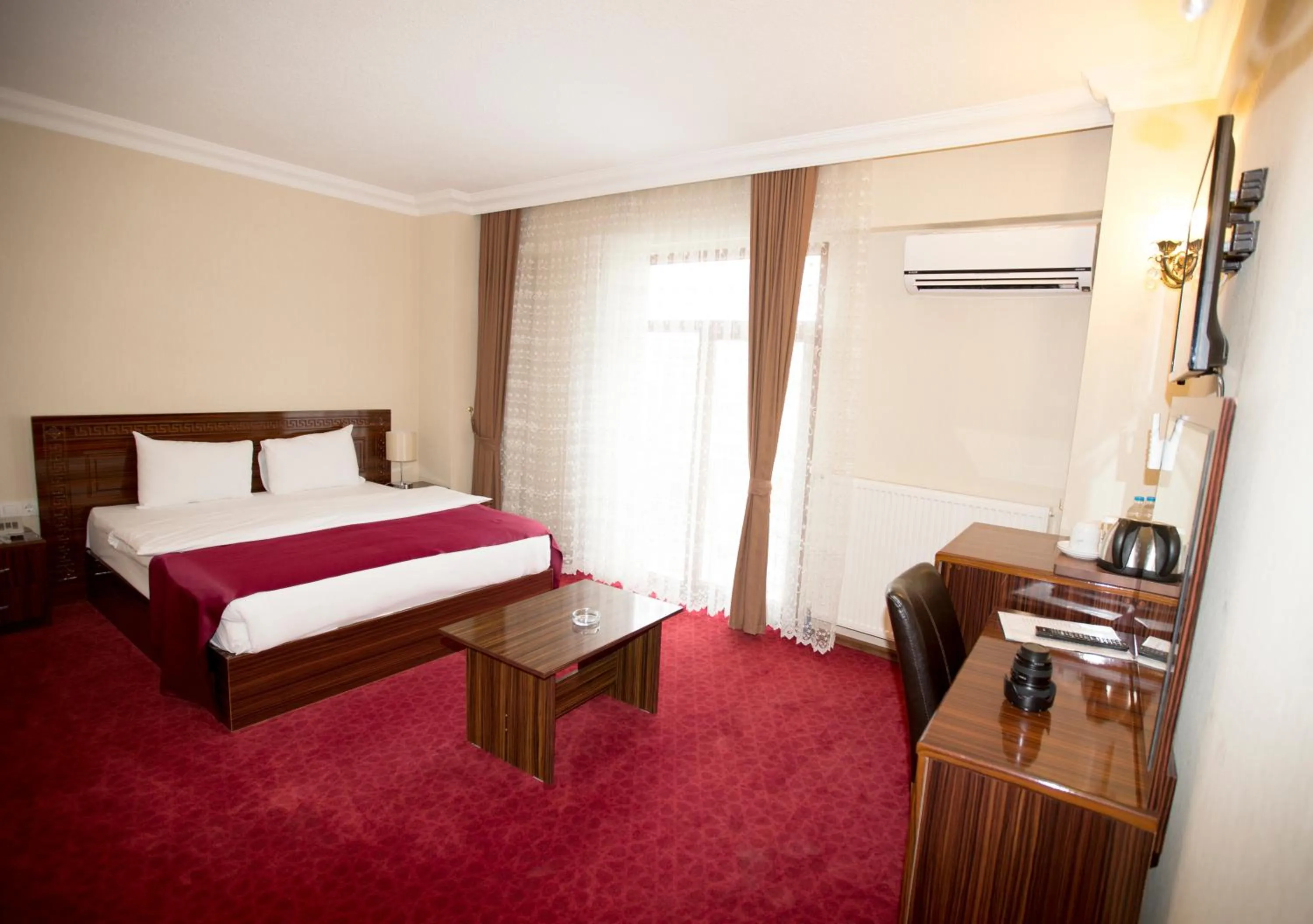 Bed in Resmina Hotel