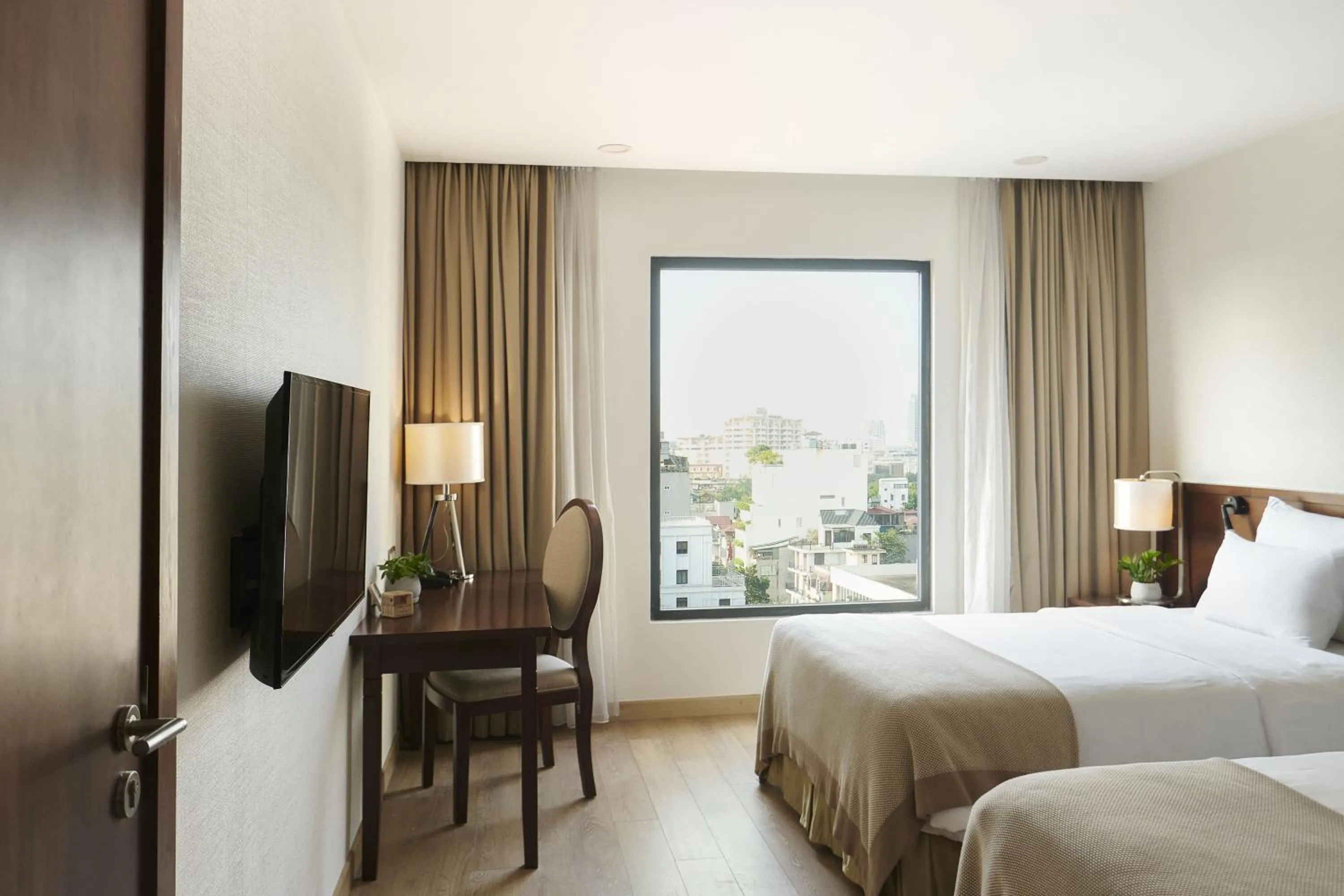 Bed in The Ann Hanoi Hotel & Spa