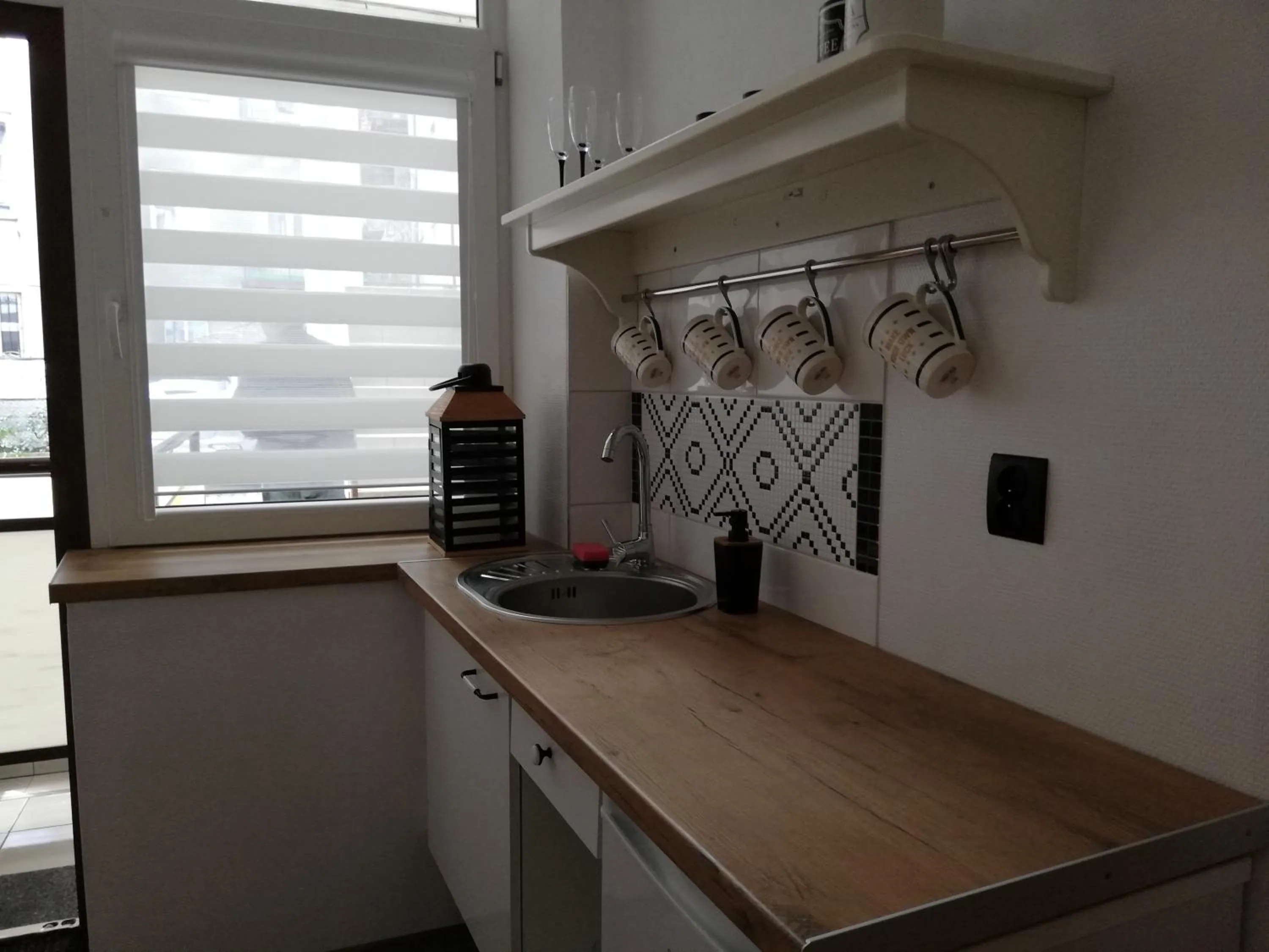 Kitchen or kitchenette in Red Carpet Hostel