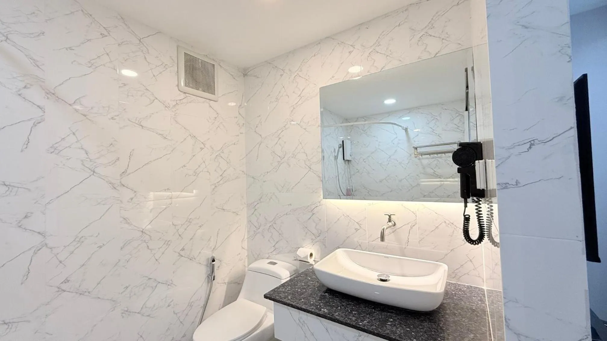 Shower in Issara House Bangkok