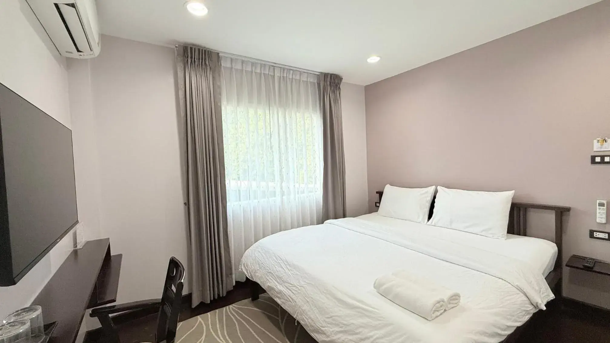 Bed in Issara House Bangkok Bed in Issara House Bangkok