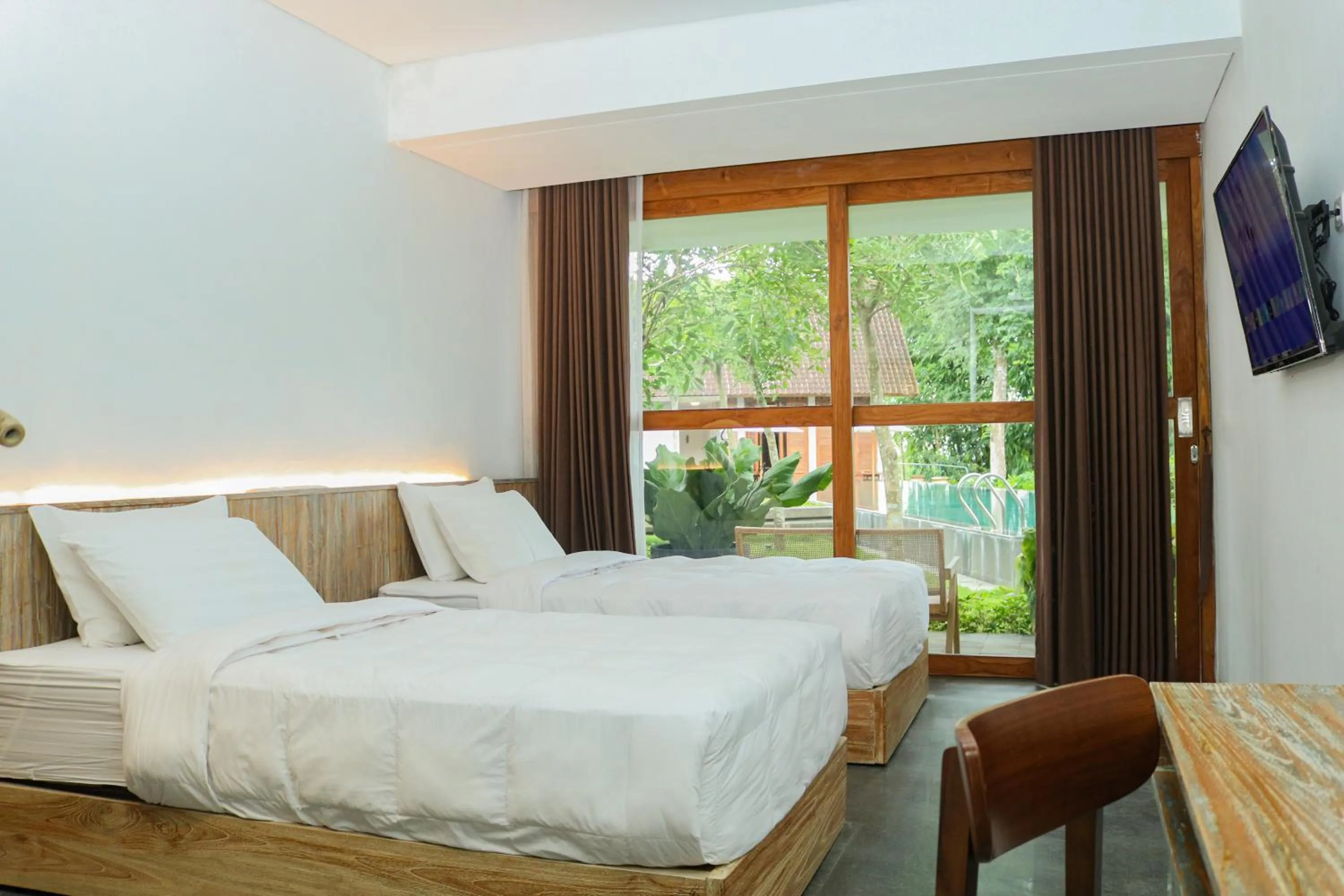 Bed in The Setumbu Experience, ARTOTEL Curated