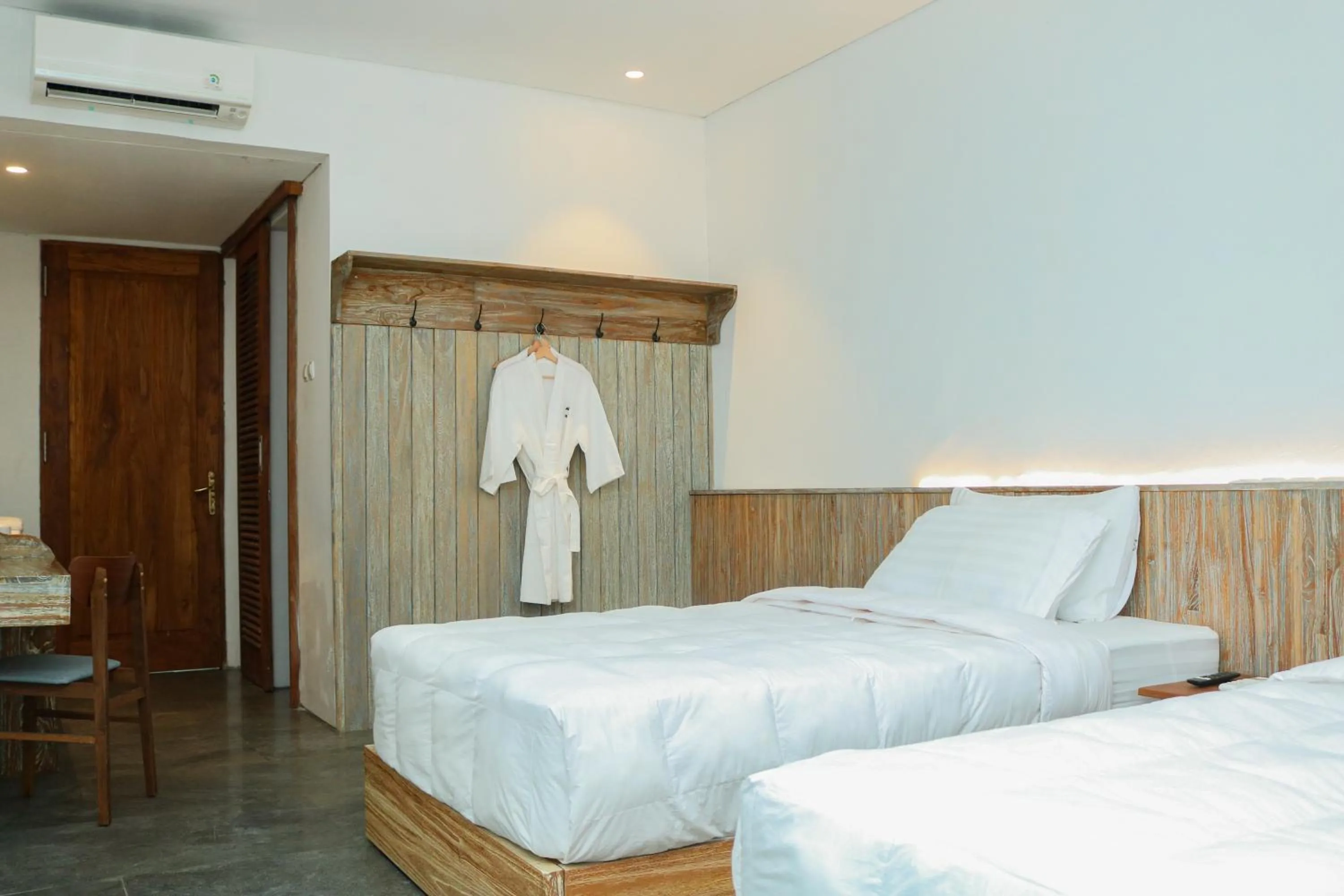 Bed in The Setumbu Experience, ARTOTEL Curated