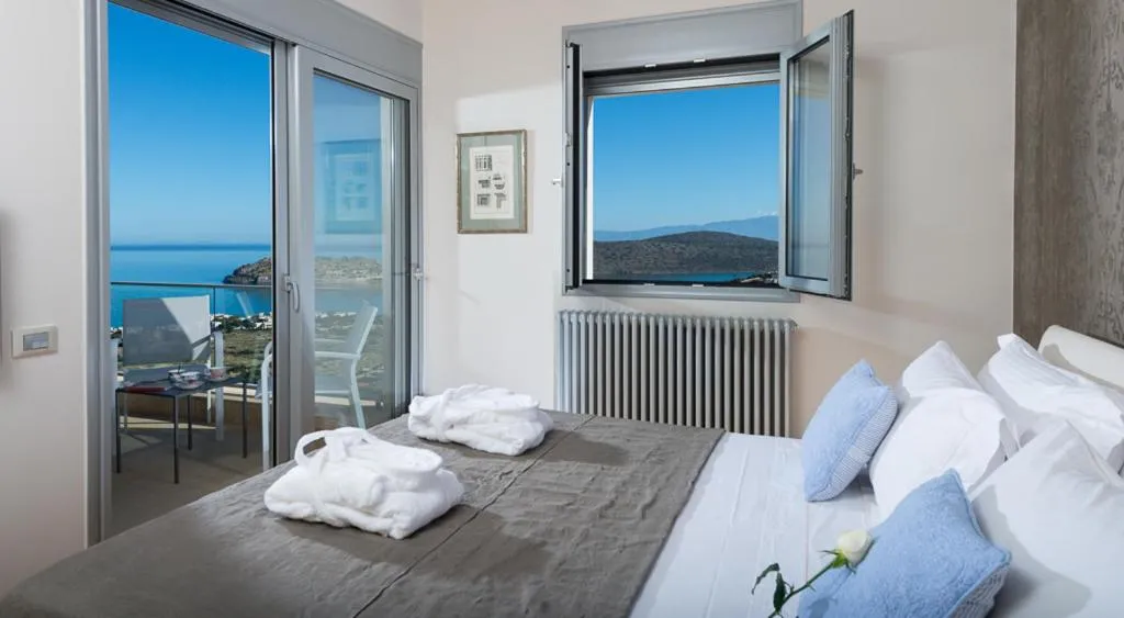 Landmark view, Bed in Elounda Luxury Villas