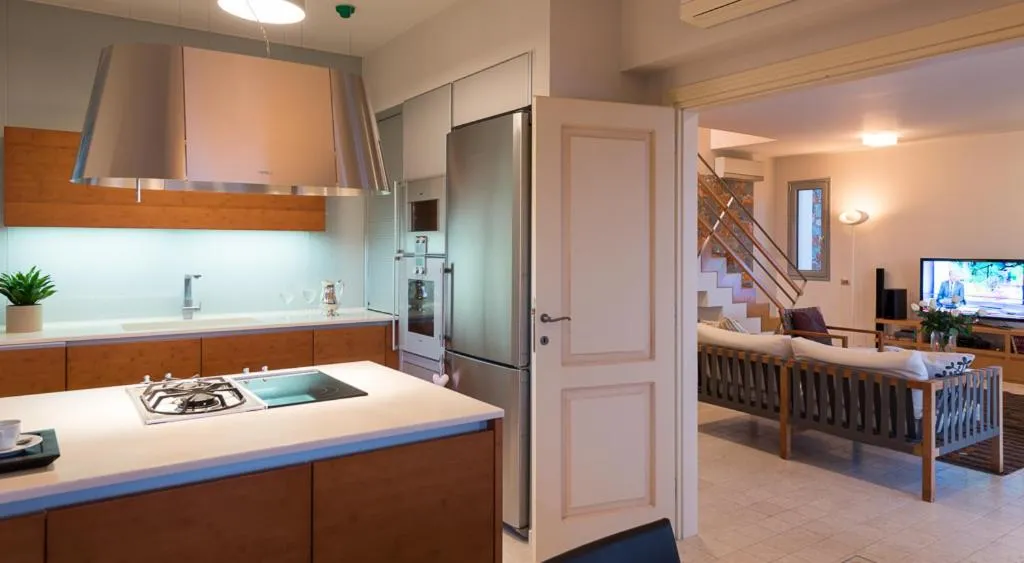 Kitchen or kitchenette in Elounda Luxury Villas