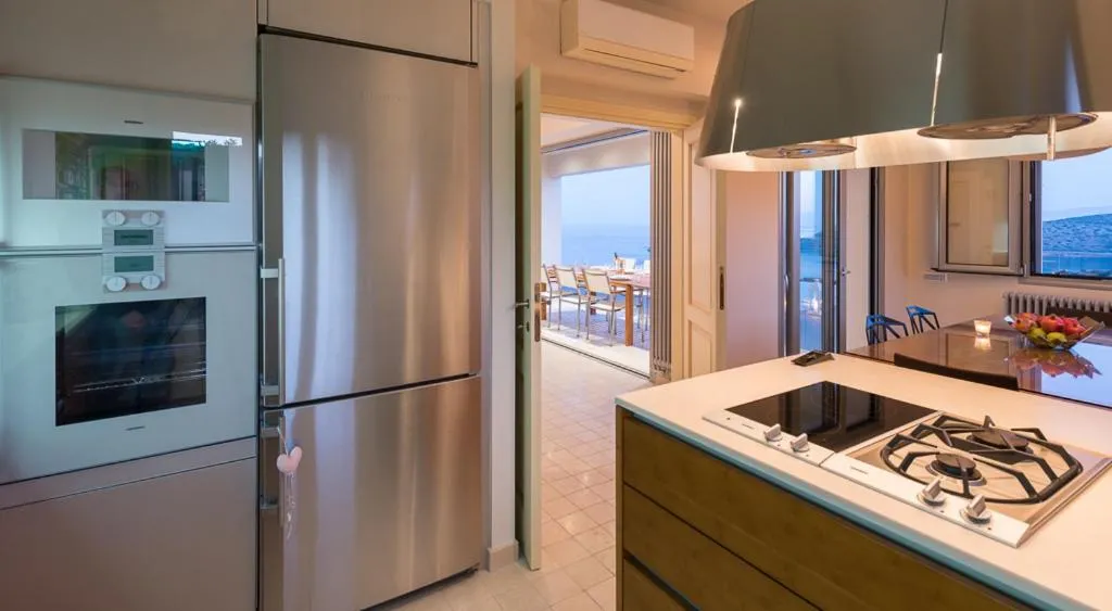 Kitchen or kitchenette in Elounda Luxury Villas