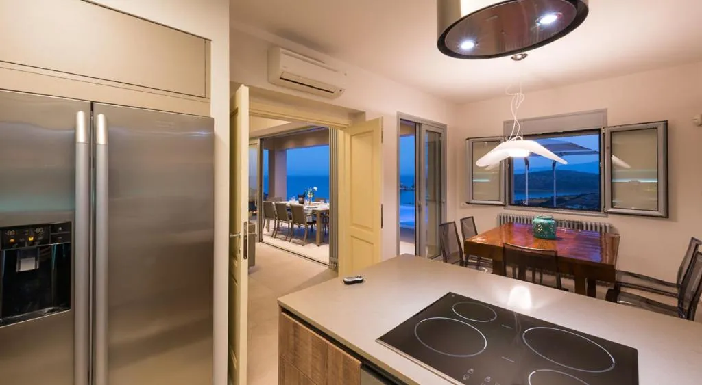 Kitchen or kitchenette in Elounda Luxury Villas