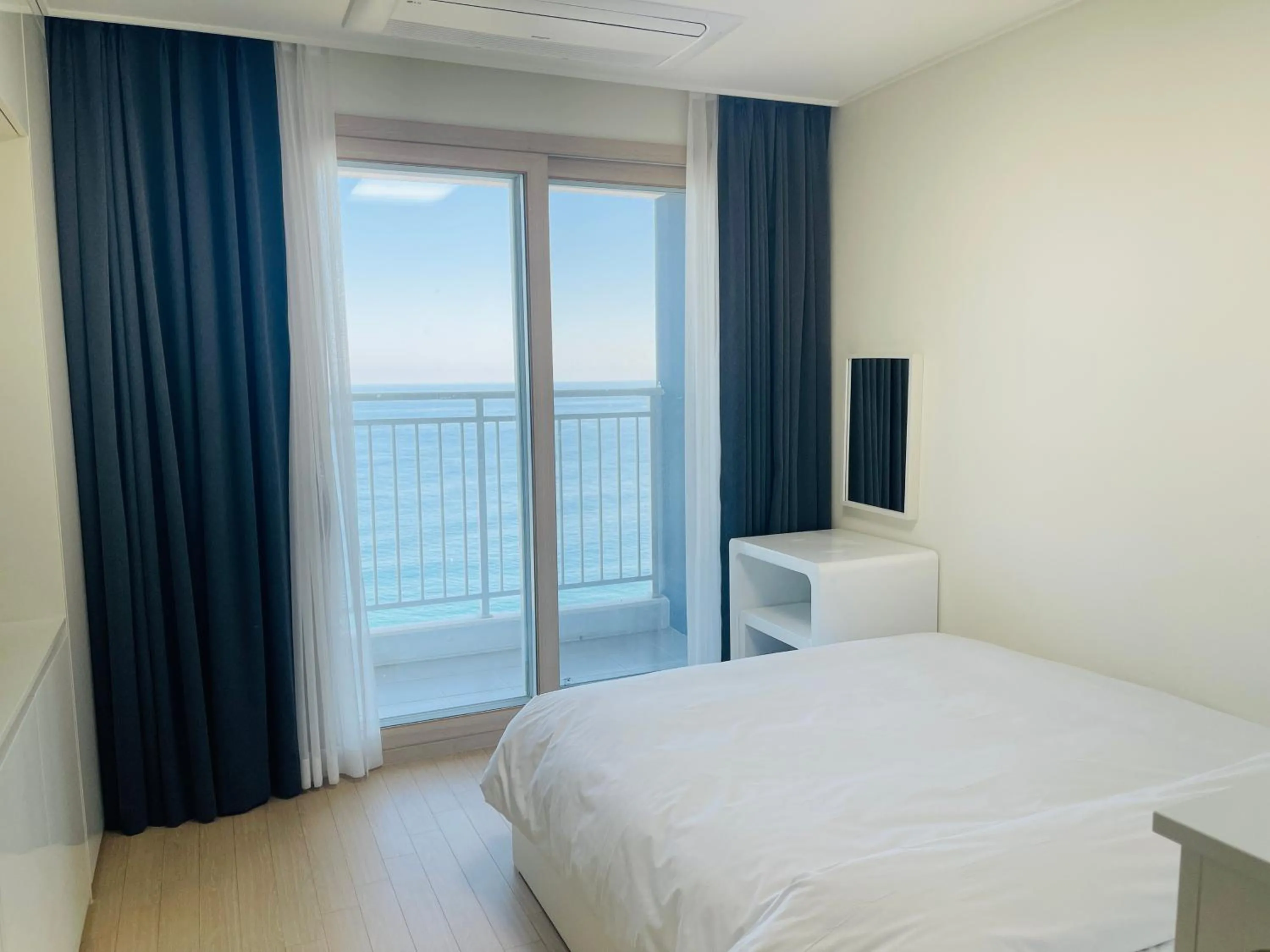 Bed in OceanStay E7 INN-TheCity