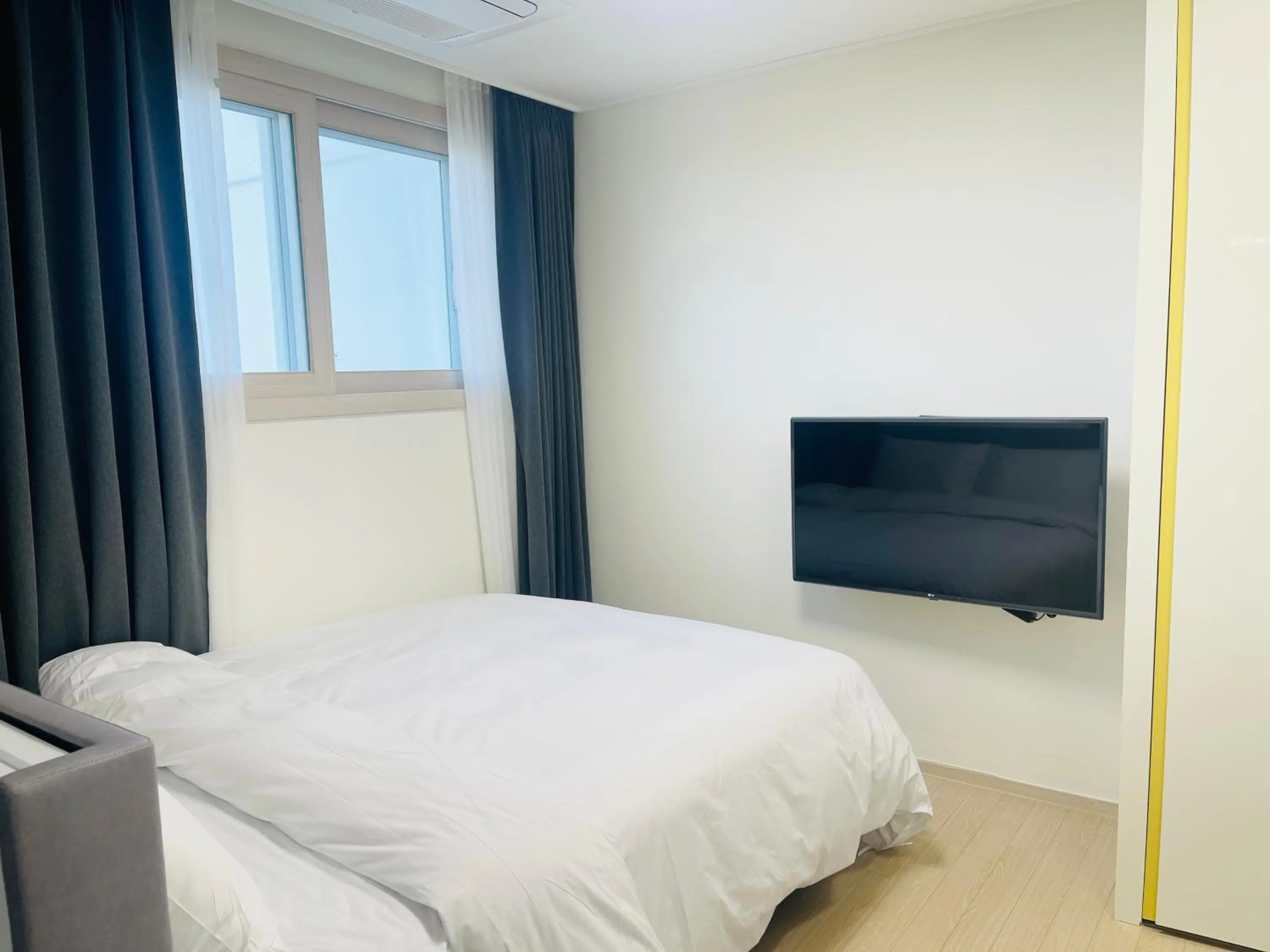 Bed in OceanStay E7 INN-TheCity