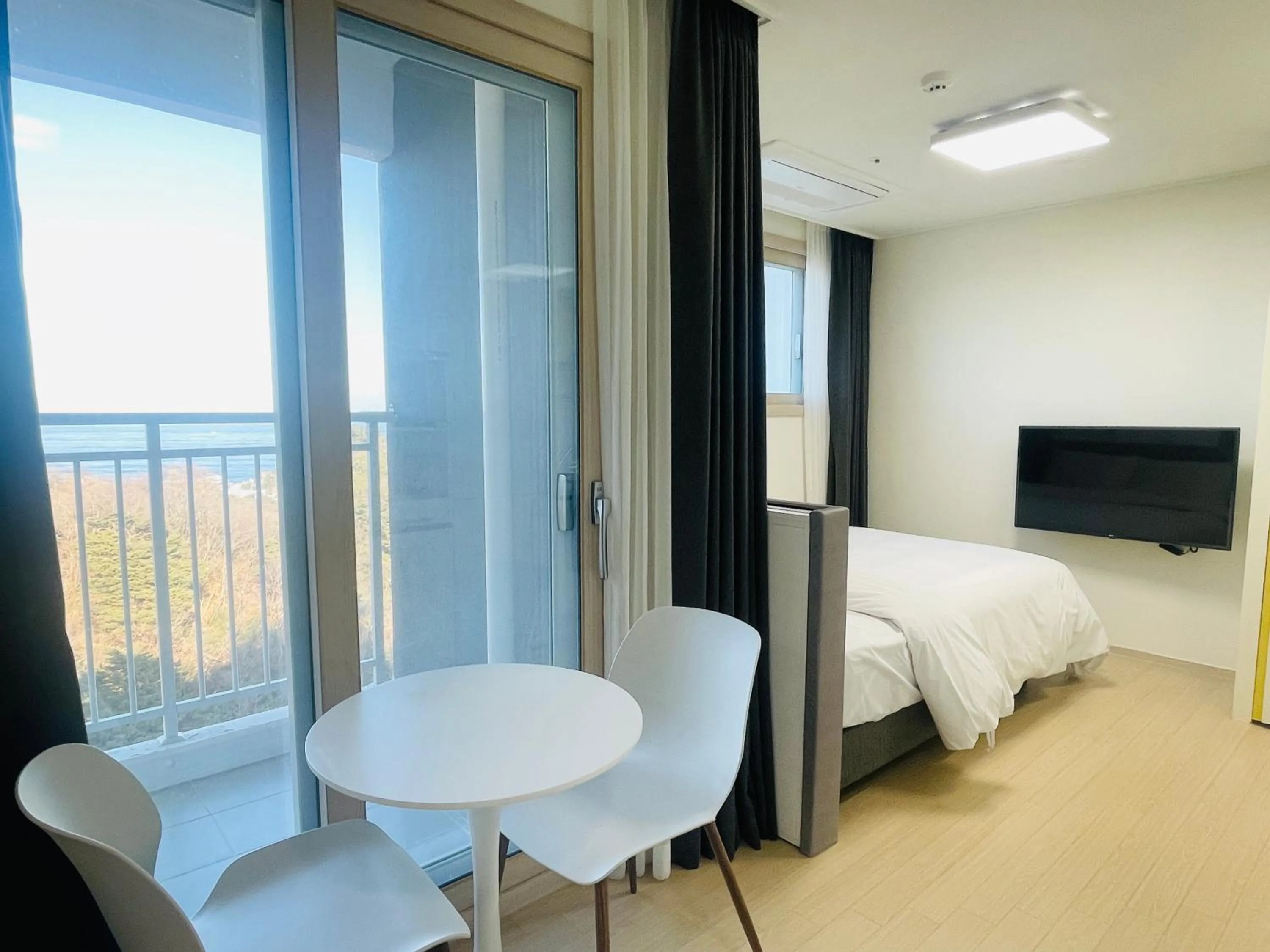 TV and multimedia, Bed in OceanStay E7 INN-TheCity