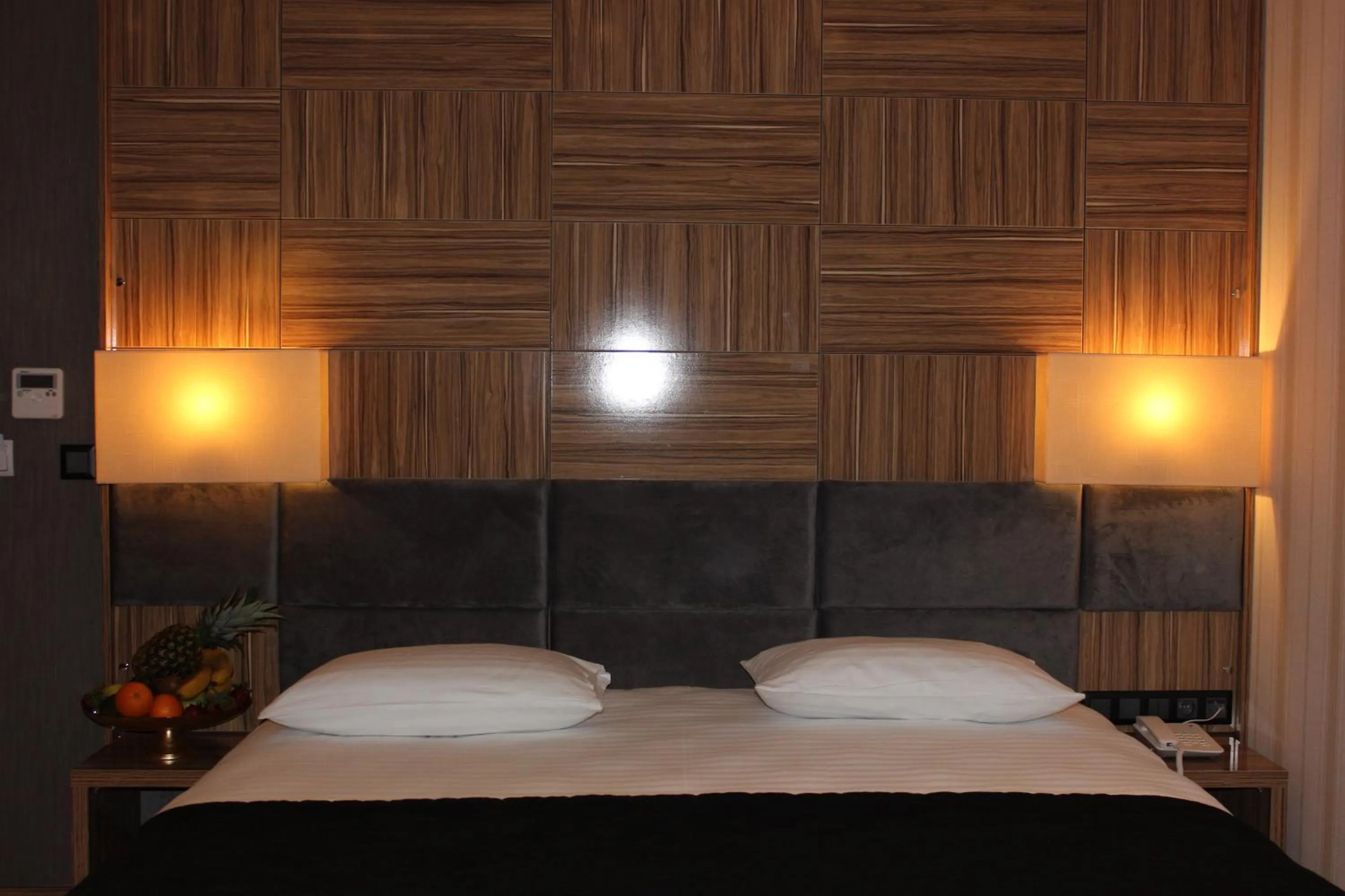 Bed in Neba Royal Hotel