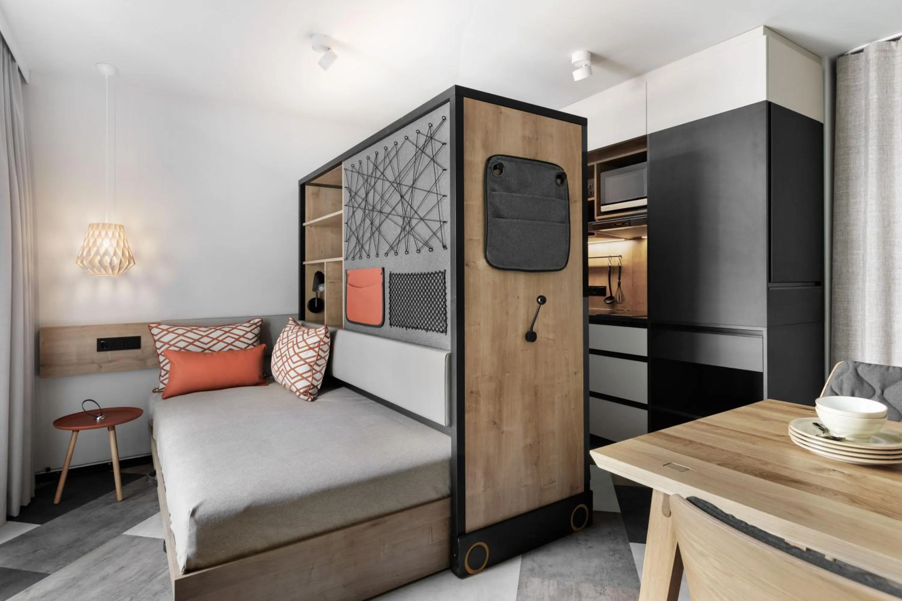 Living room, Bed in Stay KooooK Munich City - NEW OPENING