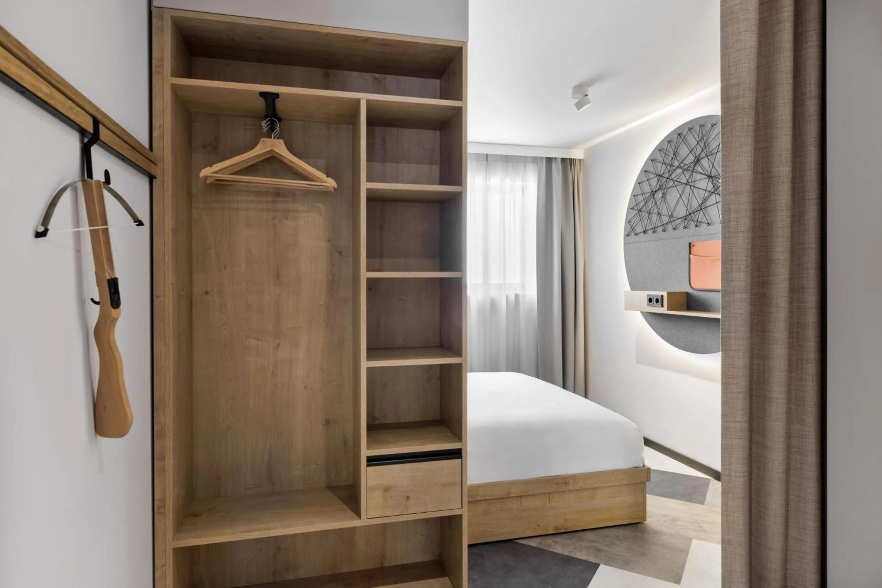 wardrobe, Bed in Stay KooooK Munich City - NEW OPENING
