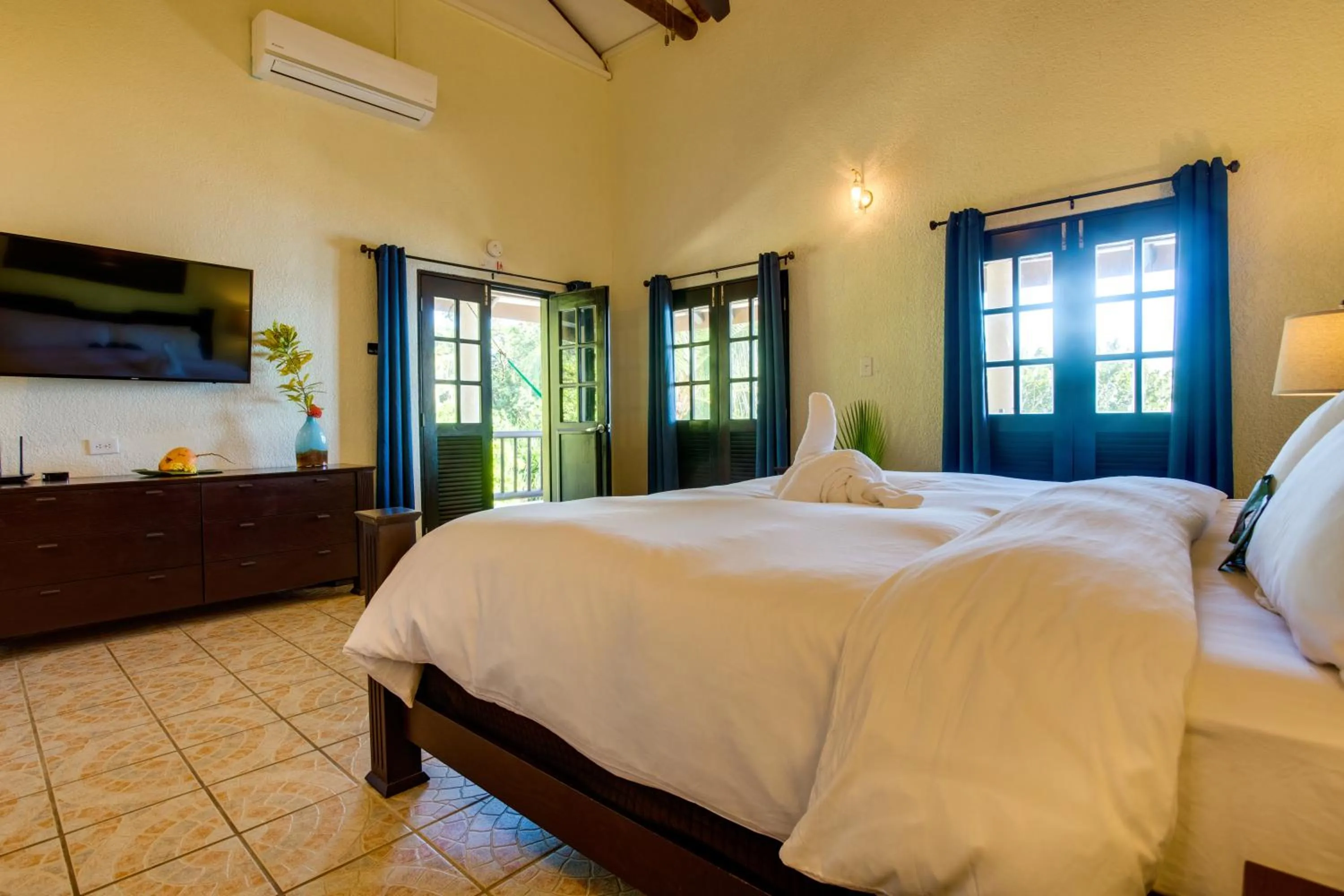 Bed in Mariposa Belize Beach Resort