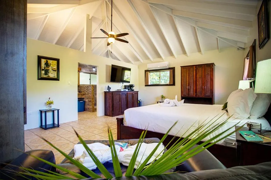 Bed in Mariposa Belize Beach Resort