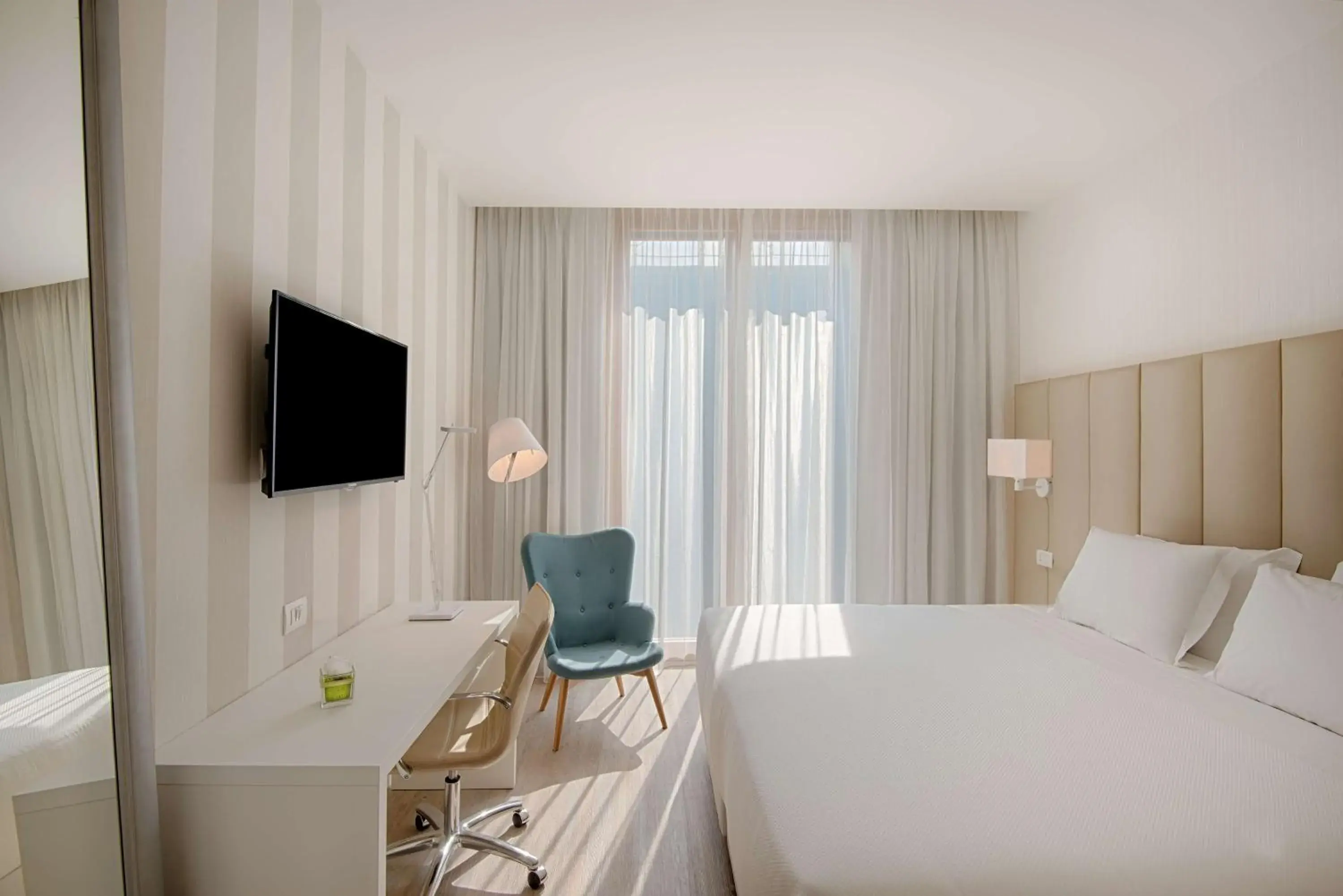 Photo of the whole room, Bed in NH Trento Photo of the whole room, Bed in NH Trento