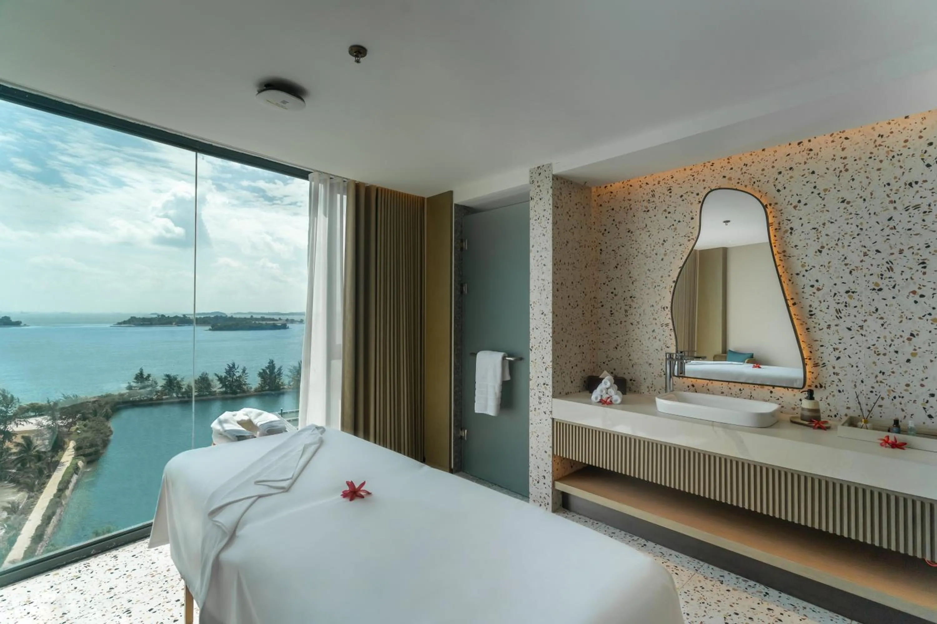 Bed in The Westin Nirup Island Resort & Spa