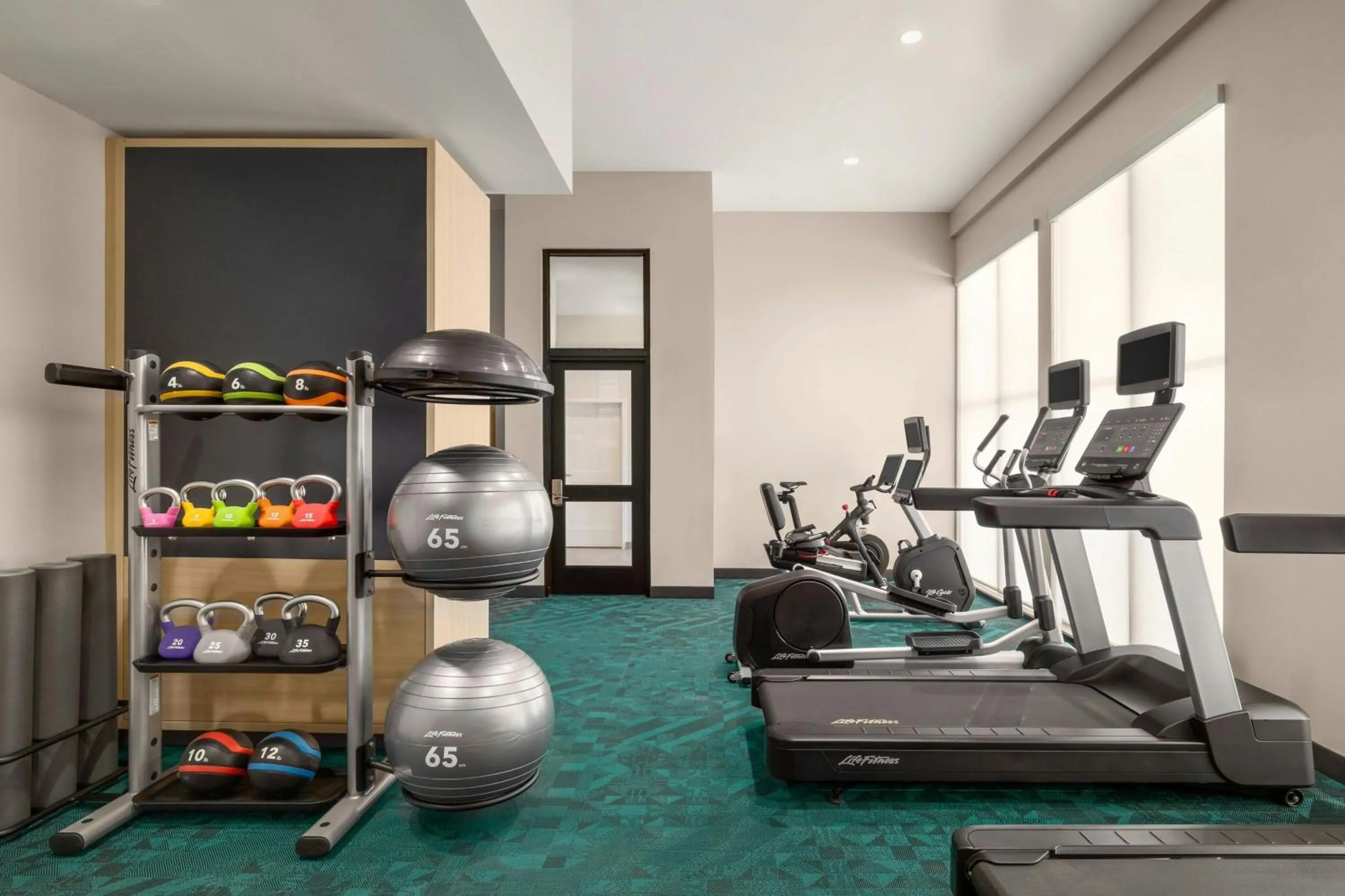 Fitness centre/facilities in TownePlace Suites by Marriott Williston