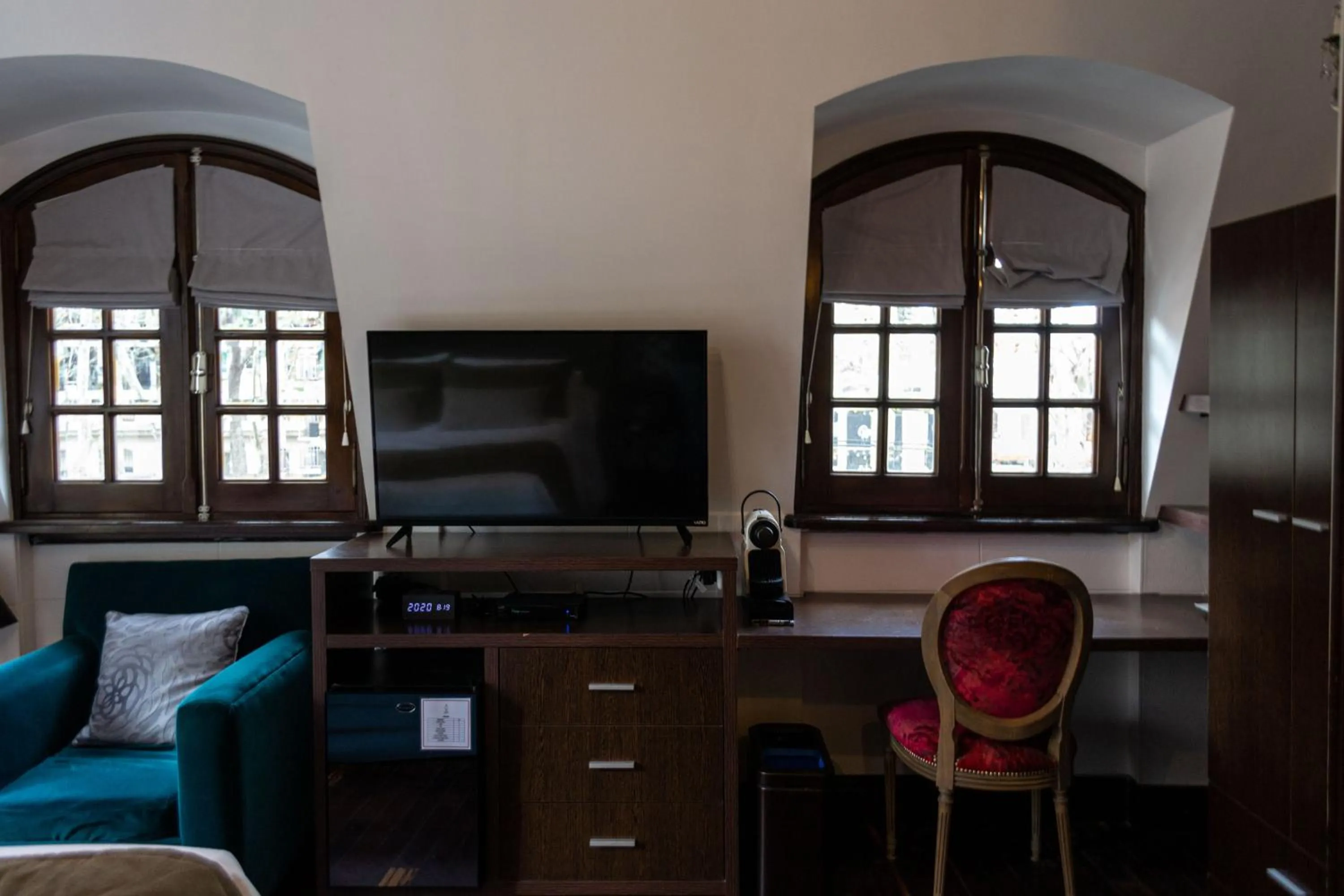 Communal lounge/ TV room in Miravida Soho Hotel & Wine Bar