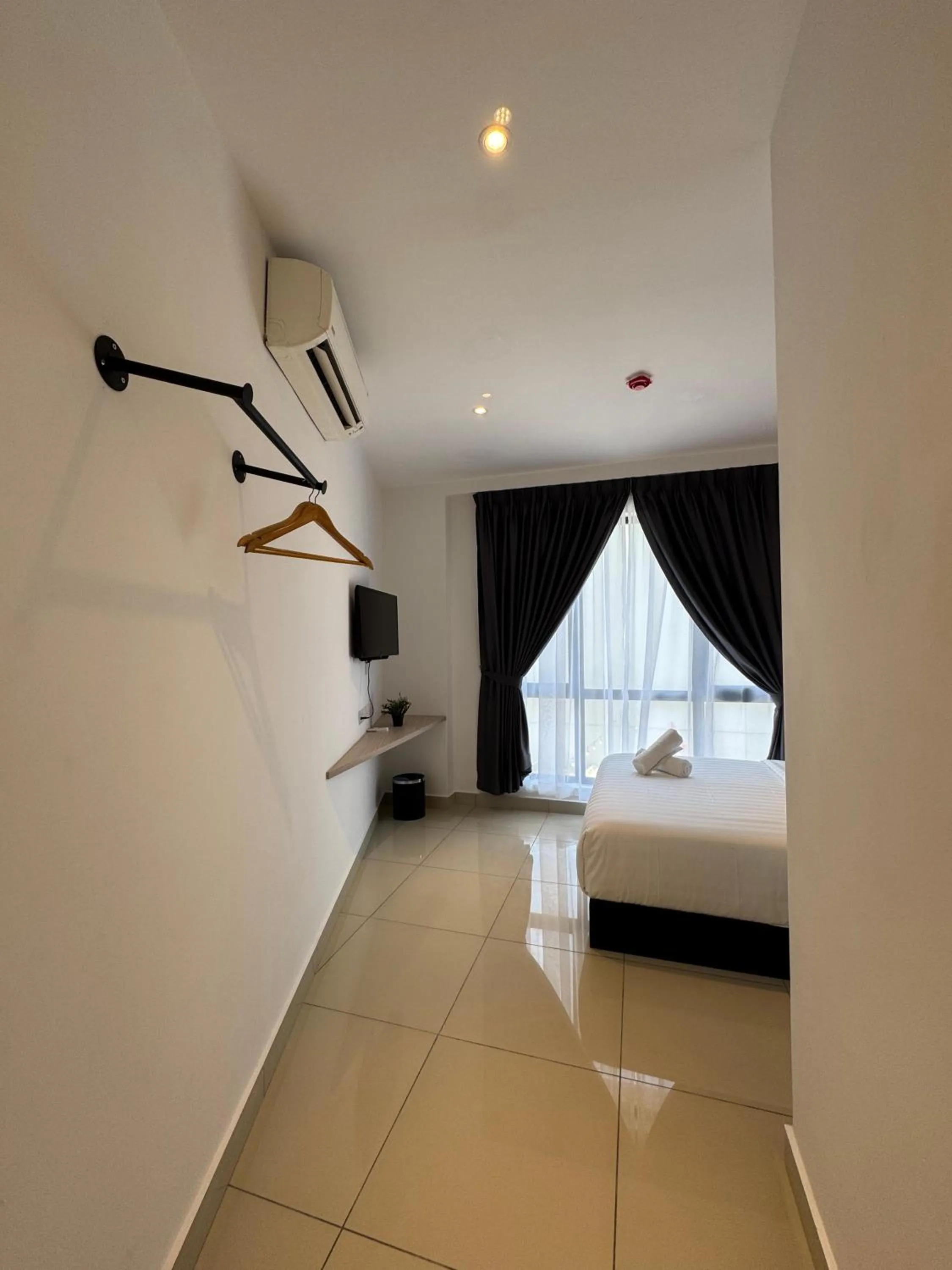 Bed in Maca Hotel by Sky Hive