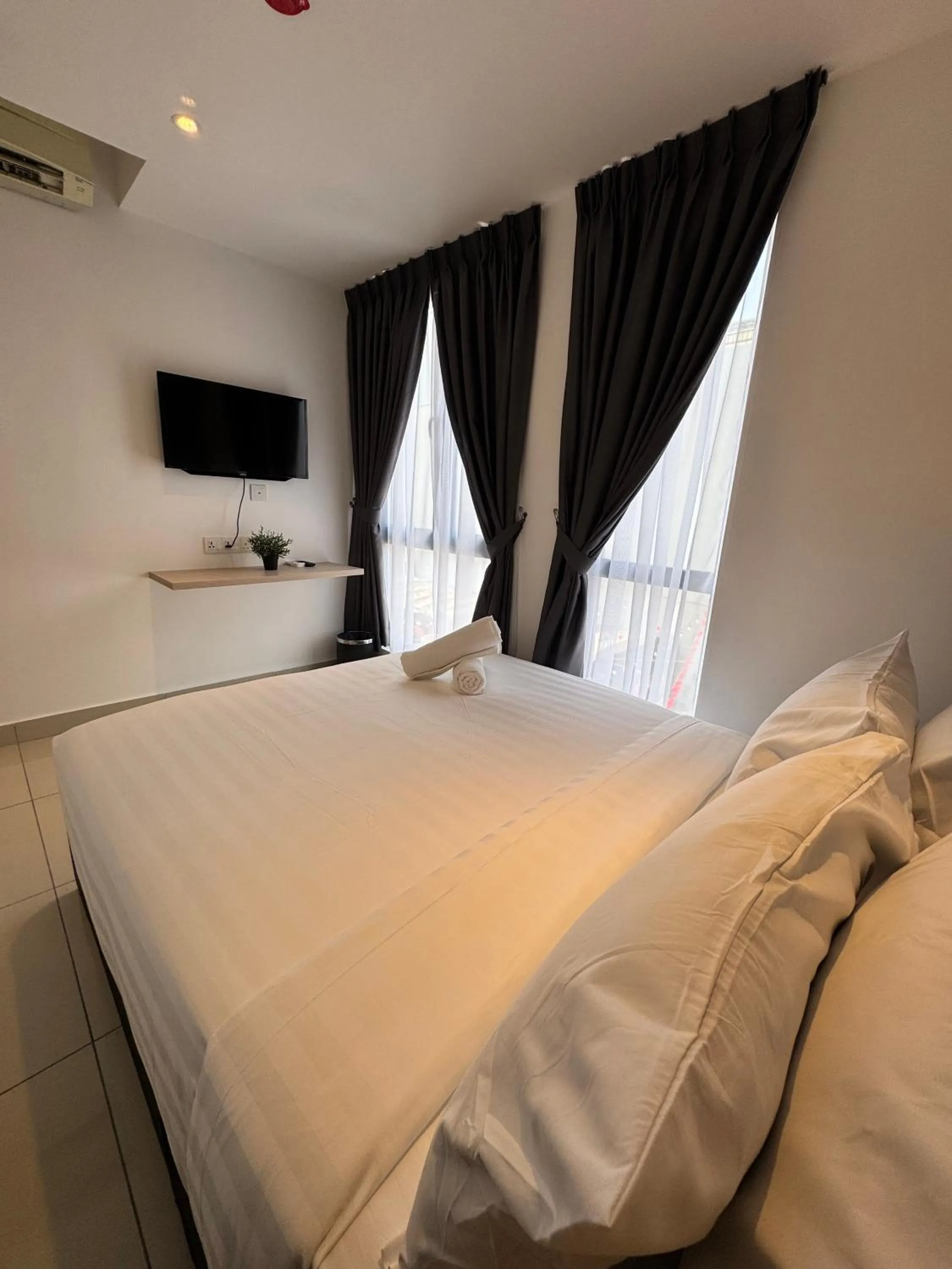 Bed in Maca Hotel by Sky Hive