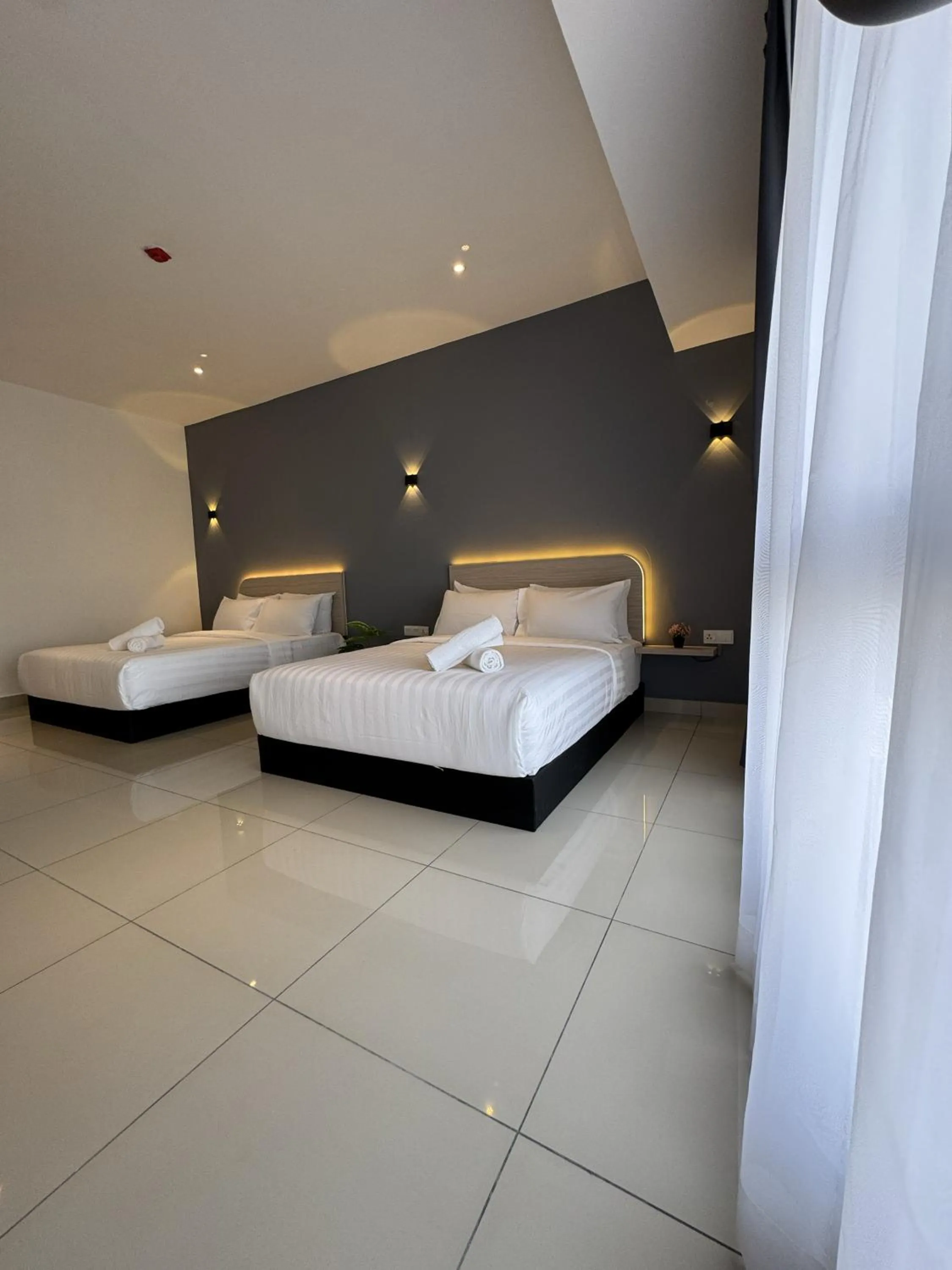 Bed in Maca Hotel by Sky Hive