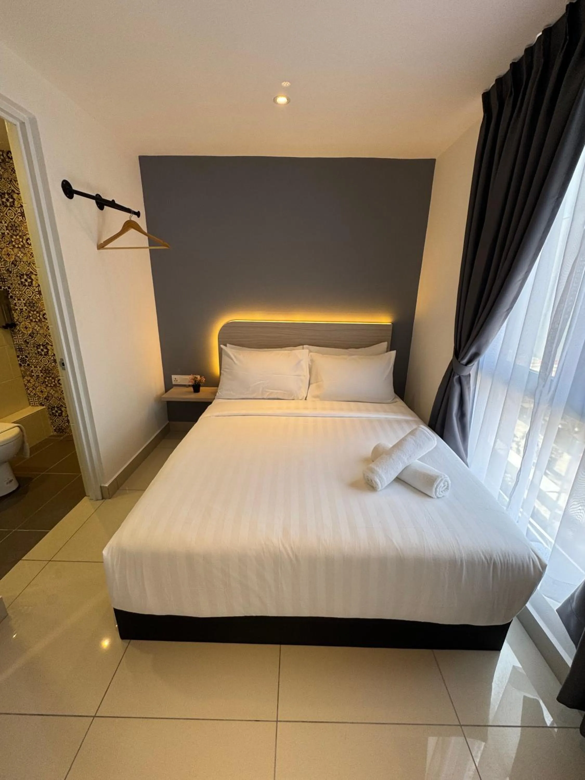 Bed in Maca Hotel by Sky Hive
