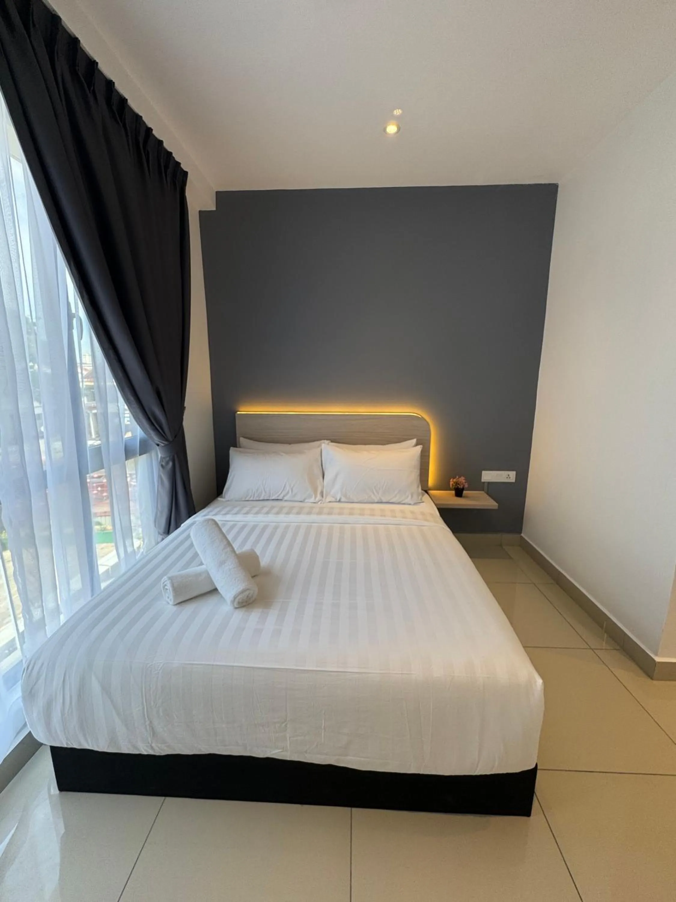 Bed in Maca Hotel by Sky Hive