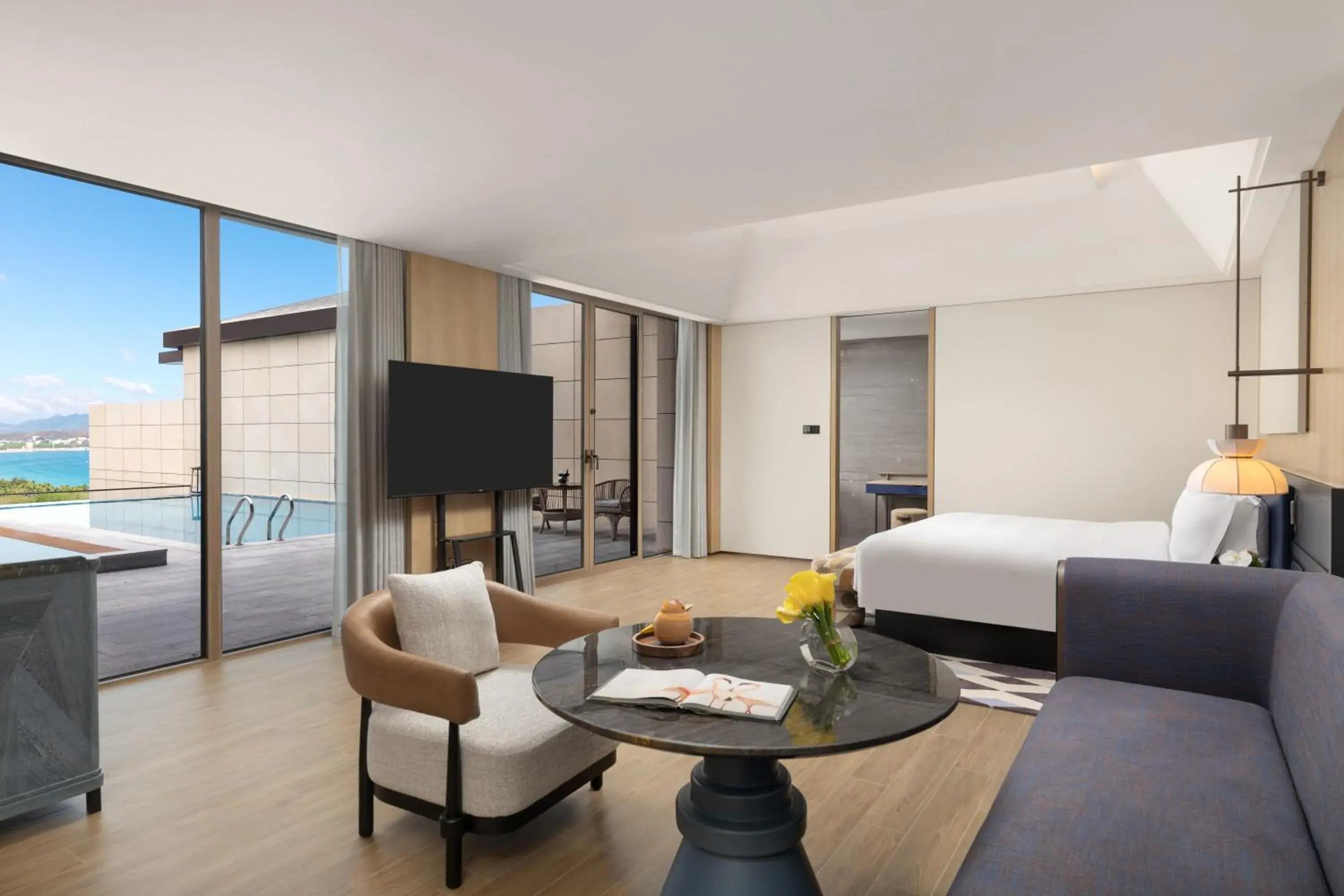 Living room, Bed in voco Sanya Dadonghai by IHG Living room, Bed in voco Sanya Dadonghai by IHG