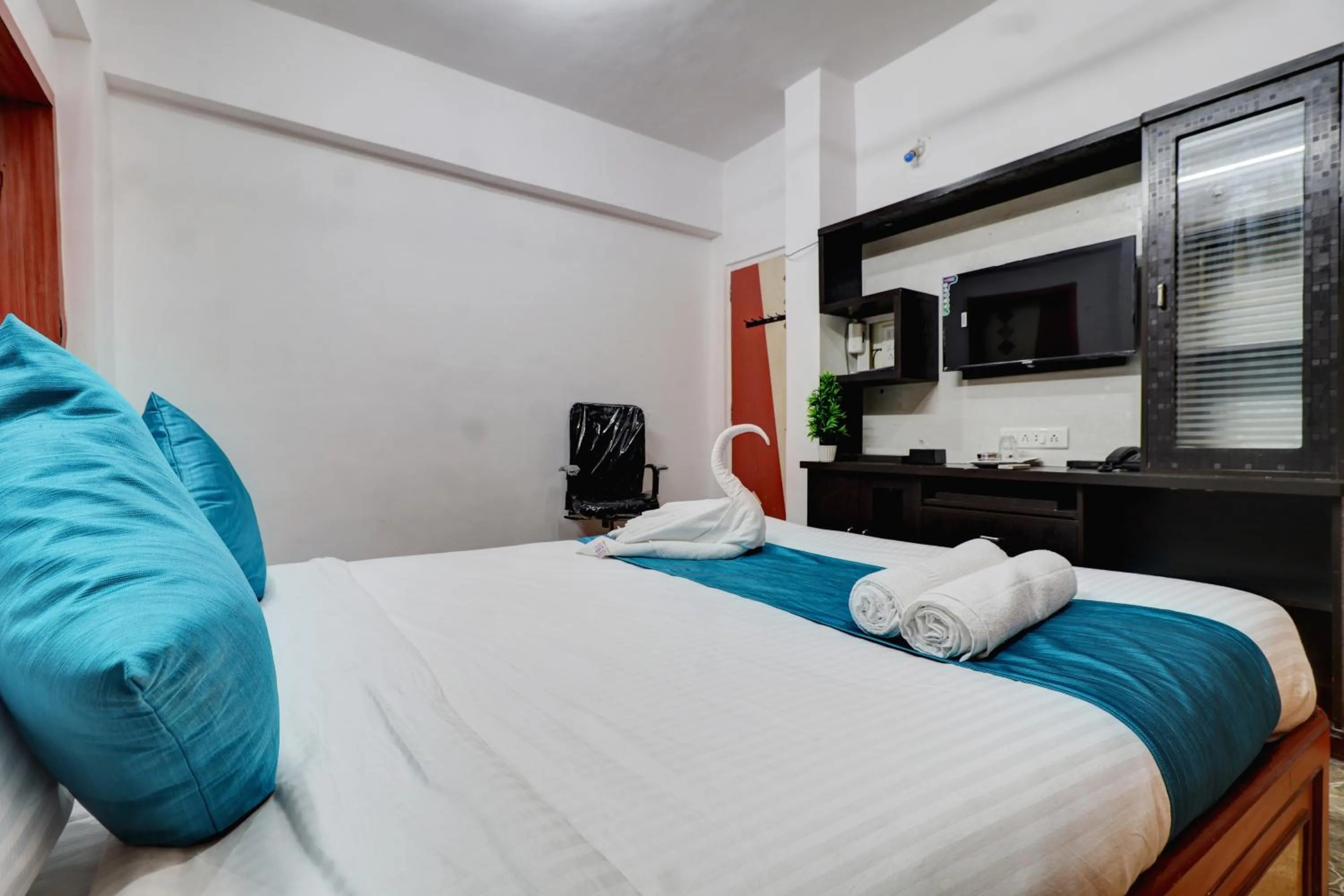 Bed in Raksha Residency